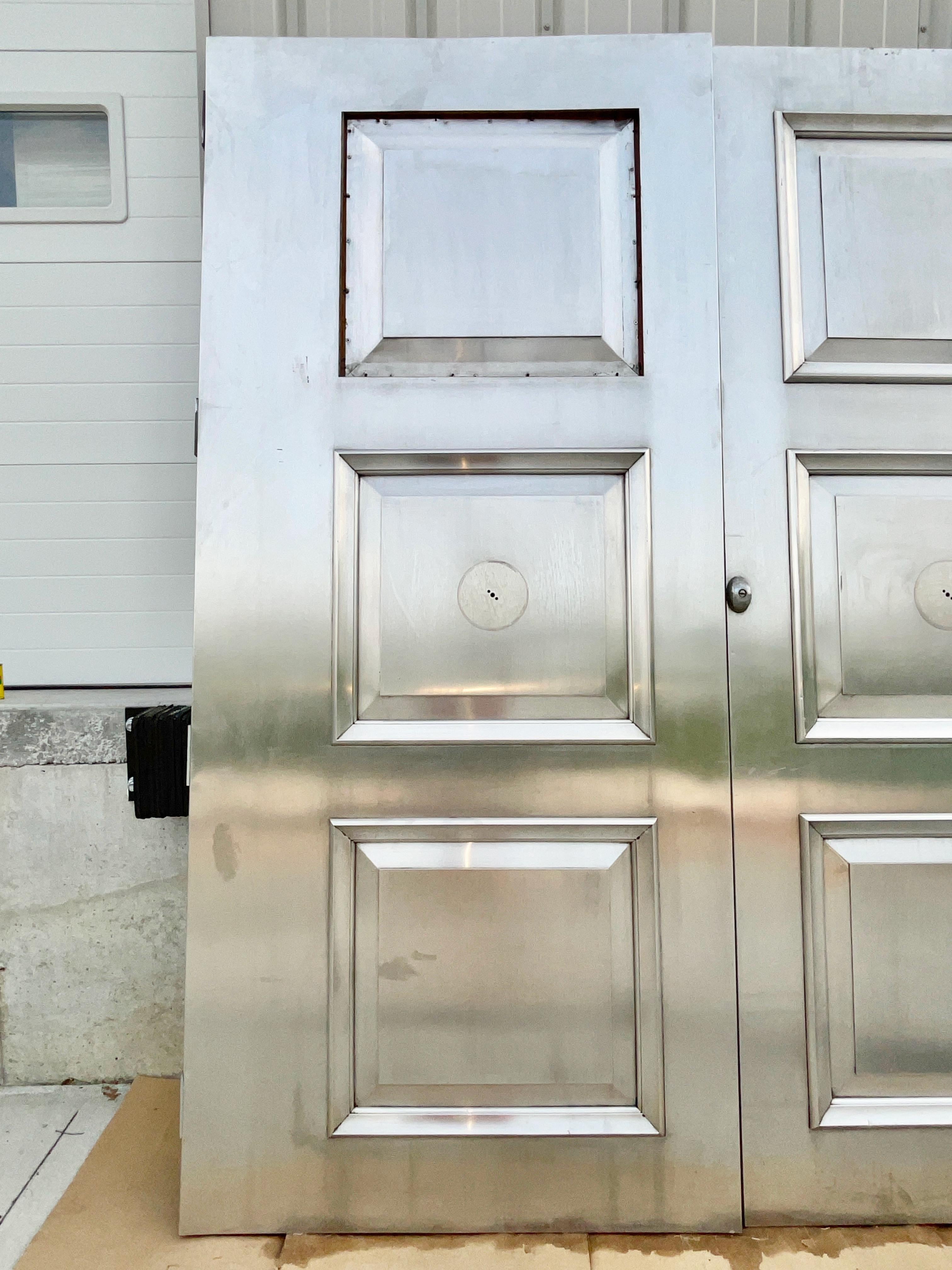 Stainless Steel Pair of Nickel Silver Three Paneled Double Doors For Sale