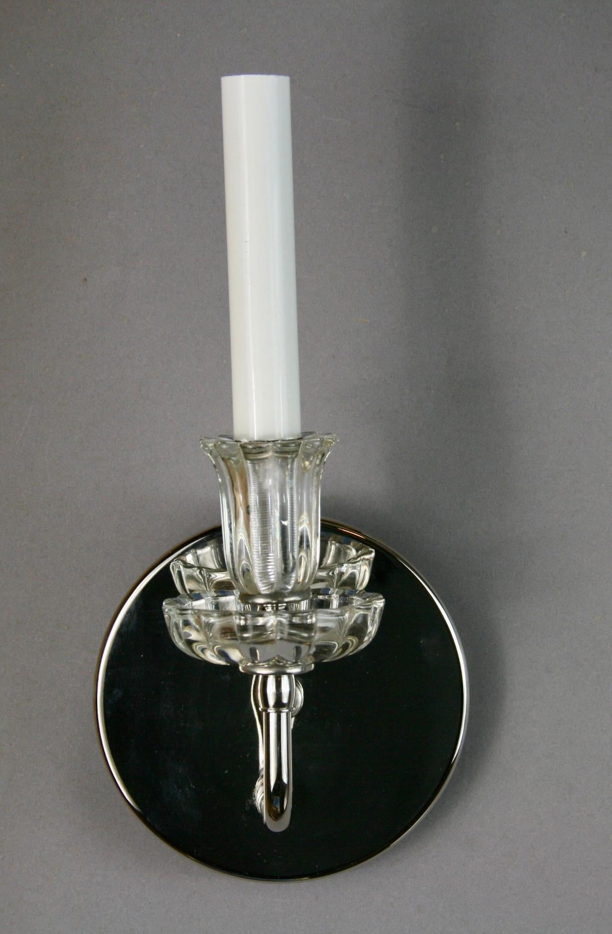 #2-1833, a pair of nickel single arm sconces featuring a glass flower shaped bobeches.
Newly rewired
2 pair available.