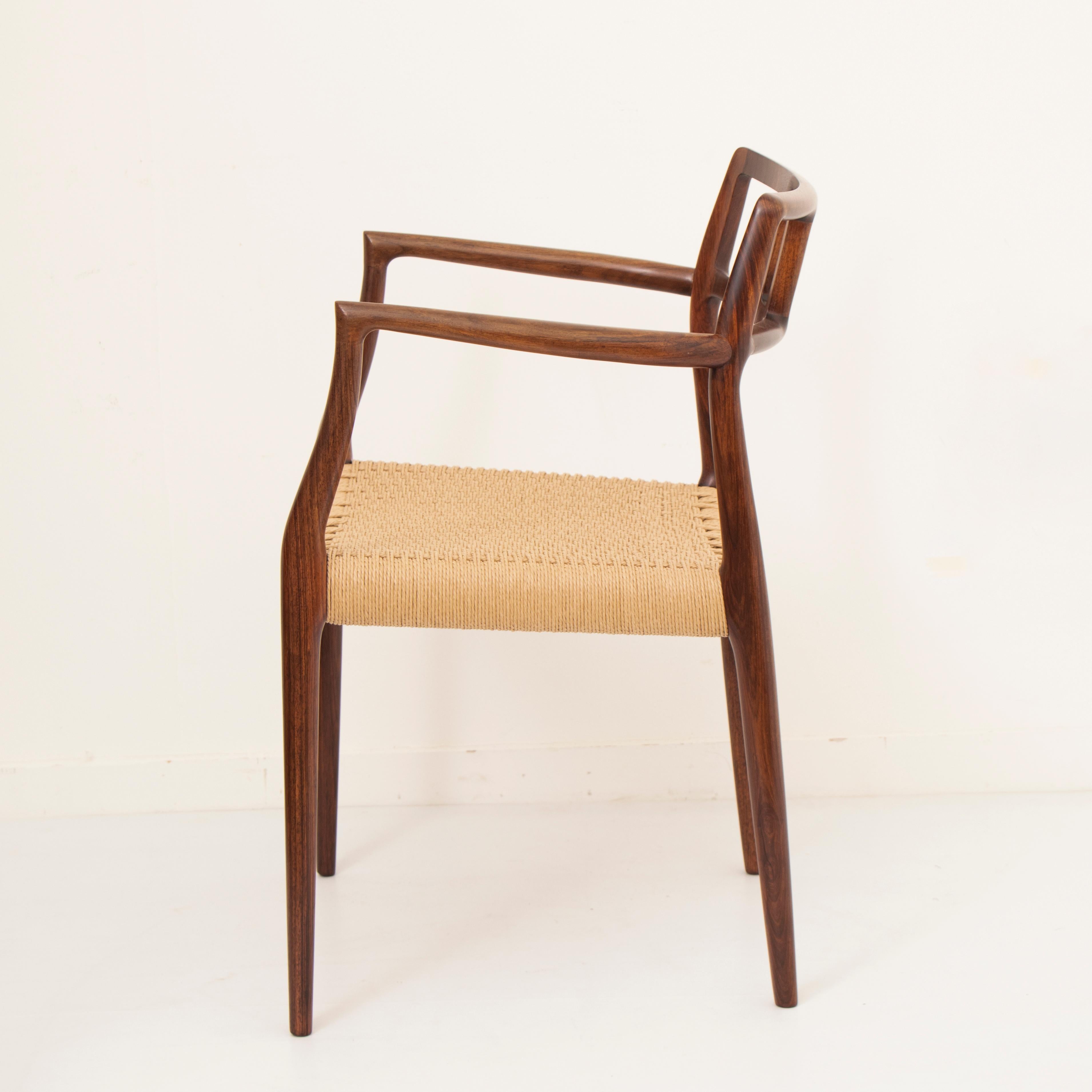 Danish Pair of Niels Møller for J.L. Møllers Rosewood Carver Dining Chairs Model 64