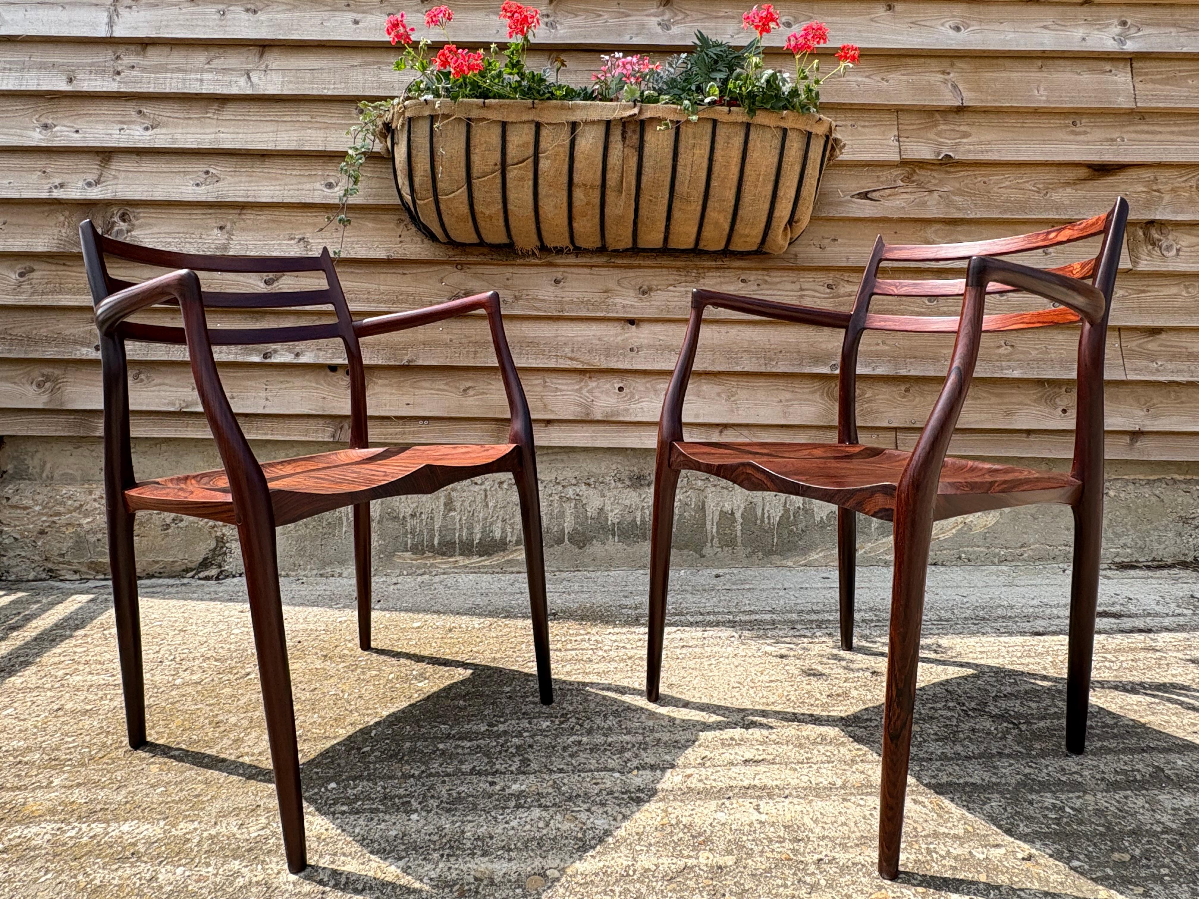 Scandinavian Modern Pair of Niels Otto Moller 50th Anniversary model 62 Chairs For Sale