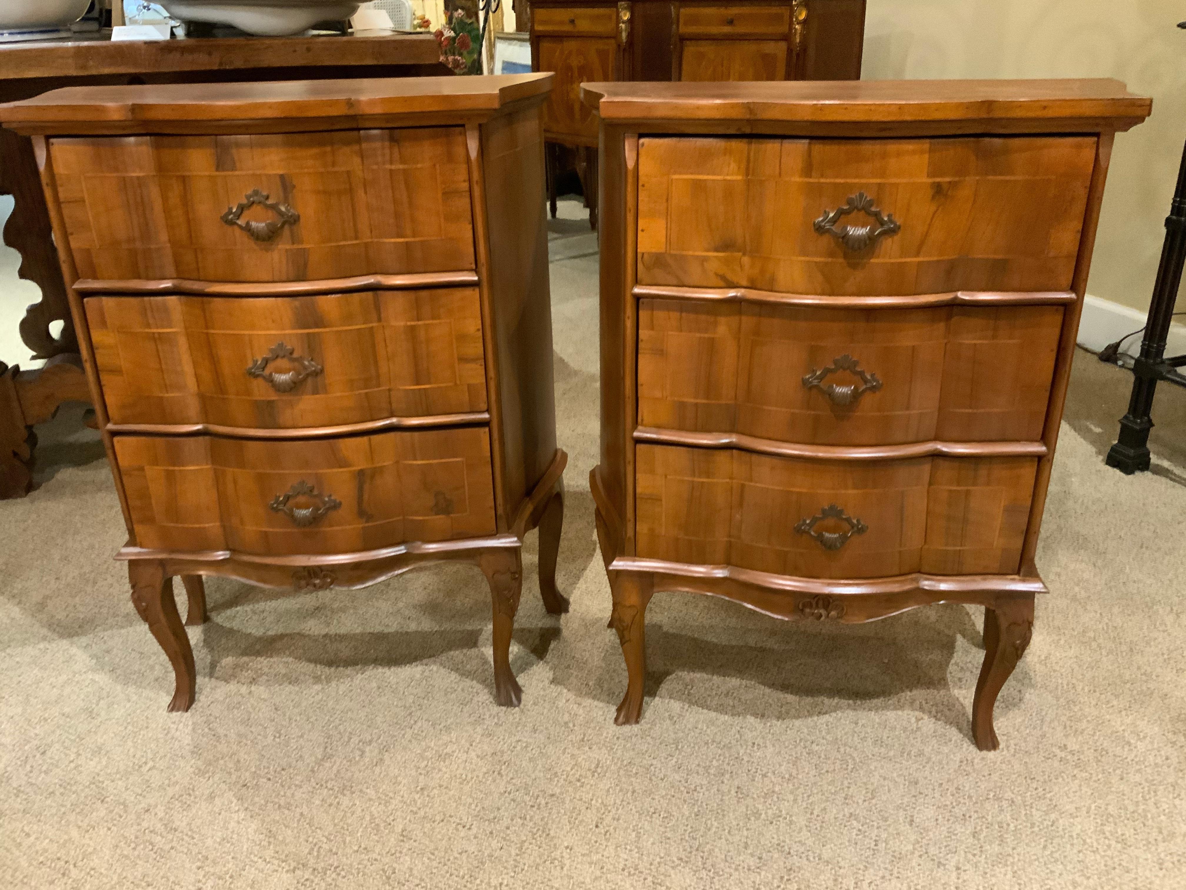 Handsome pair of French night stands/chests. Each having three
Drawers that function well with original hardware. Serpentine
Sides add a graceful line to these pieces. A curved leg both
Front and back gives a special look to this exceptional