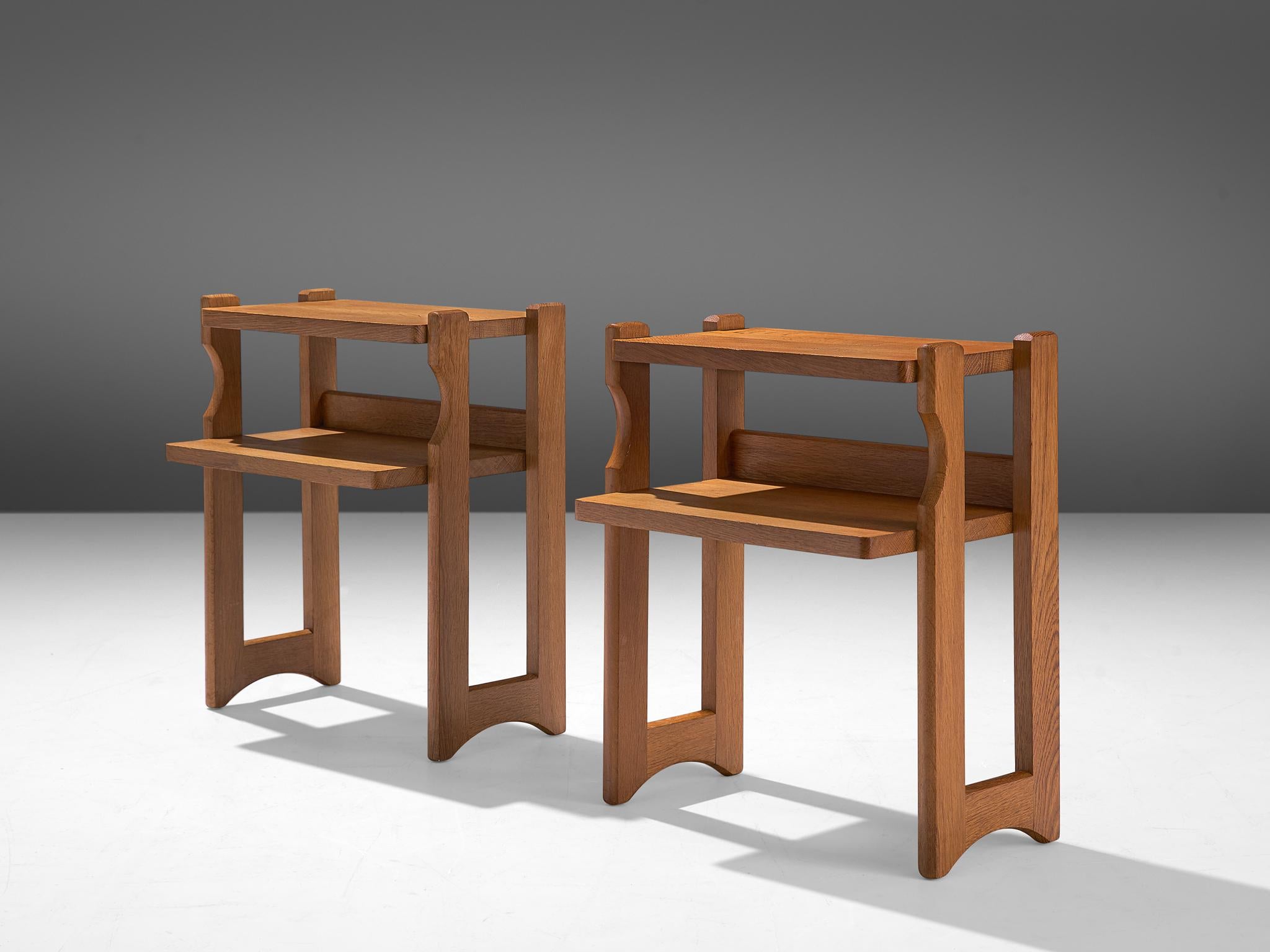 Guillerme et Chambron, nightstands, oak, France, 1960s.

Pair of nightstands with a geometric shape by Guillerme et Chambron. They are pretty corporal but are easy to lift and can be placed easily anywhere. These sculptural pieces sculptural legs