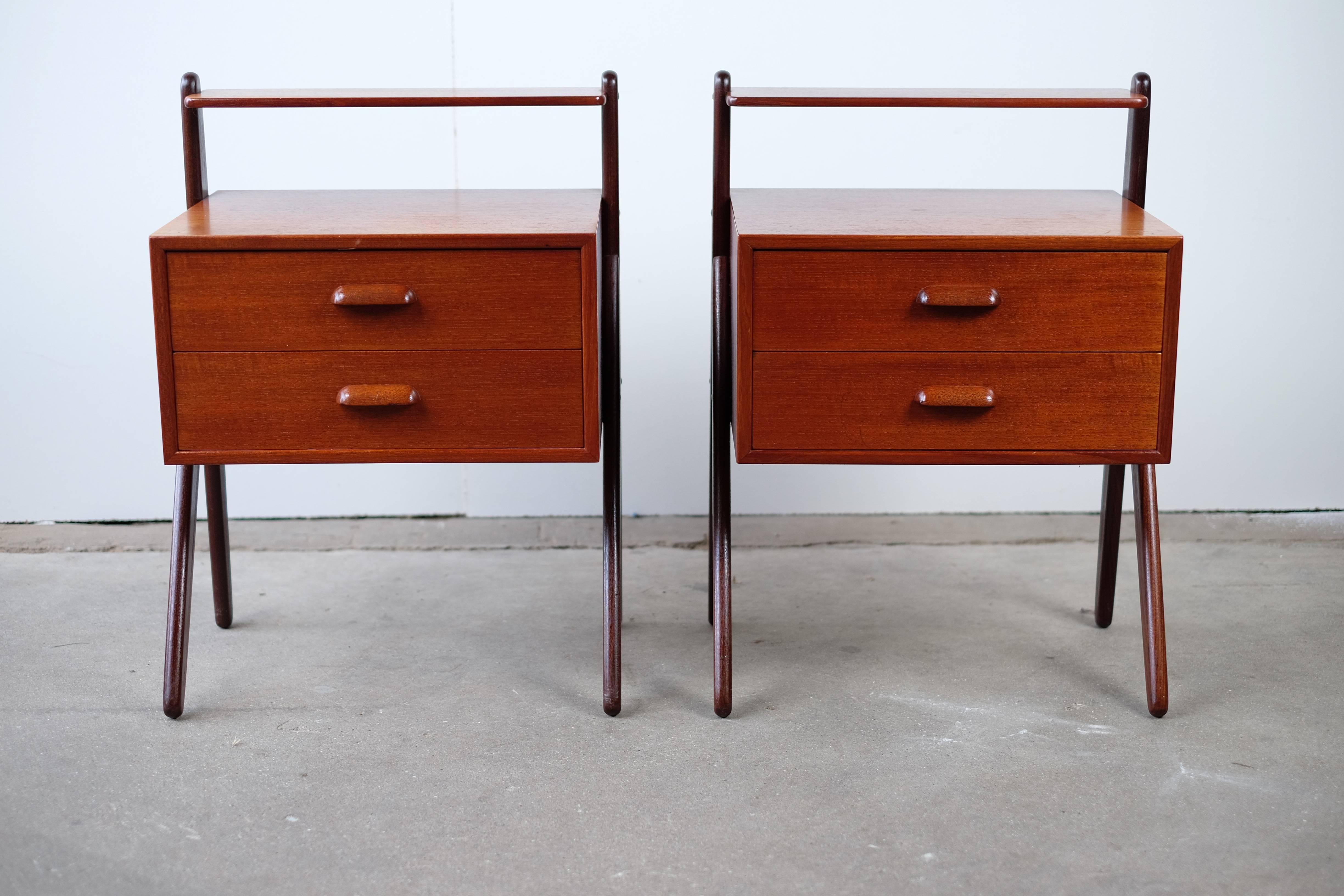 A beautiful pair of nightstands, in the front two drawers and a over shelf - manufactured at Ørum Møbelfabrik. (Stamped)

The nightstands are in vintage condition and one of them has some small holes (Please see pictures, it will be possible for