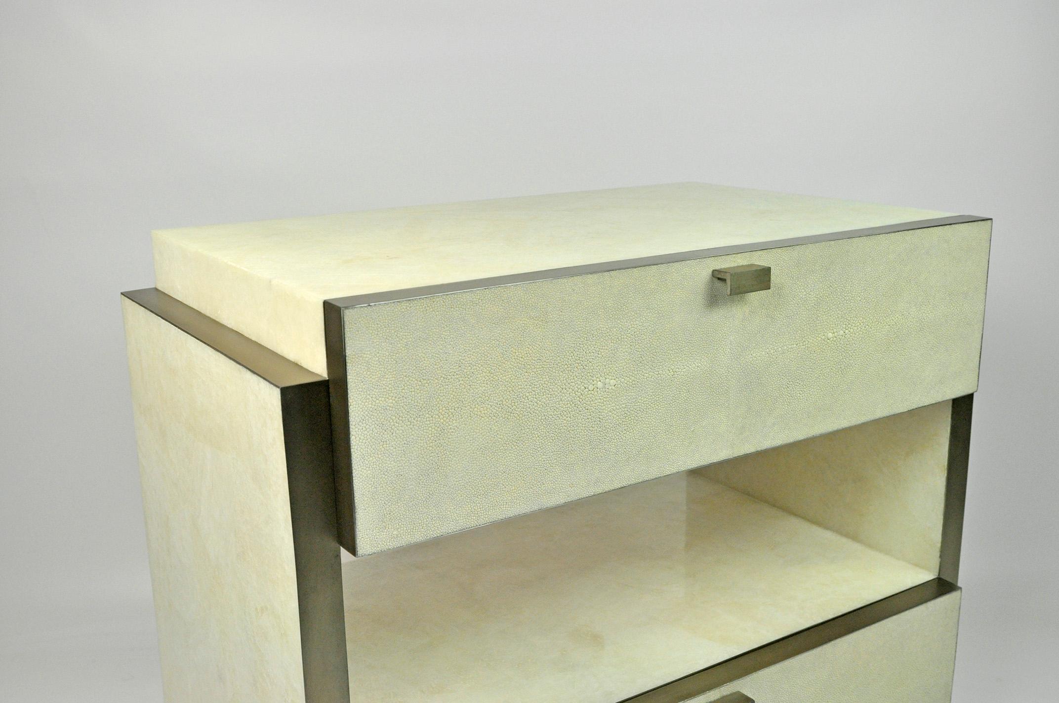 French Pair of Night Stands in White Rock crystal with steel trims by Ginger Brown For Sale
