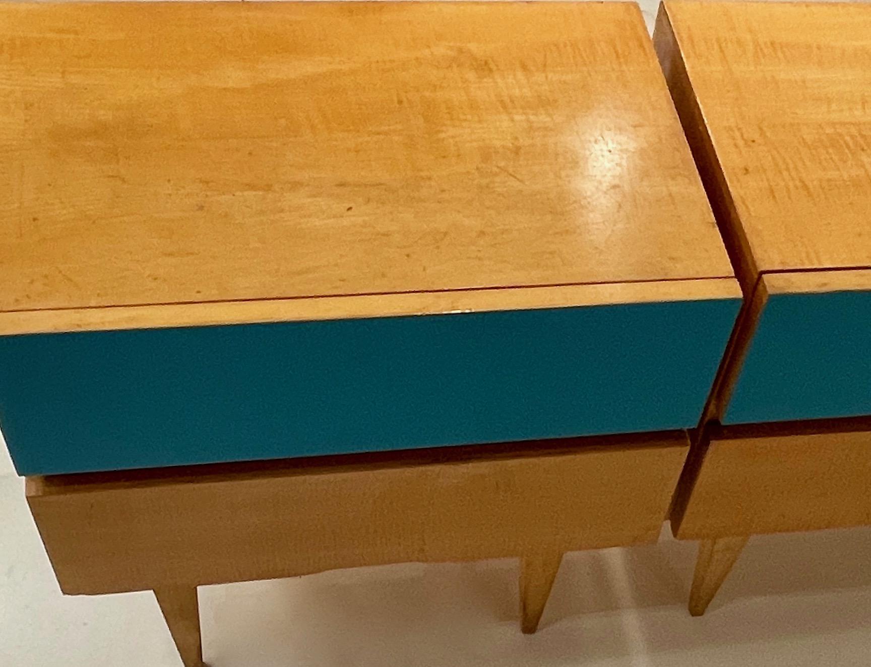 Modern-constructivist night stands or end tables.
Sycamore veneer with two drawers each ( one blue lacquer ).
In the style of Gio Ponti, Italy around 1950.
