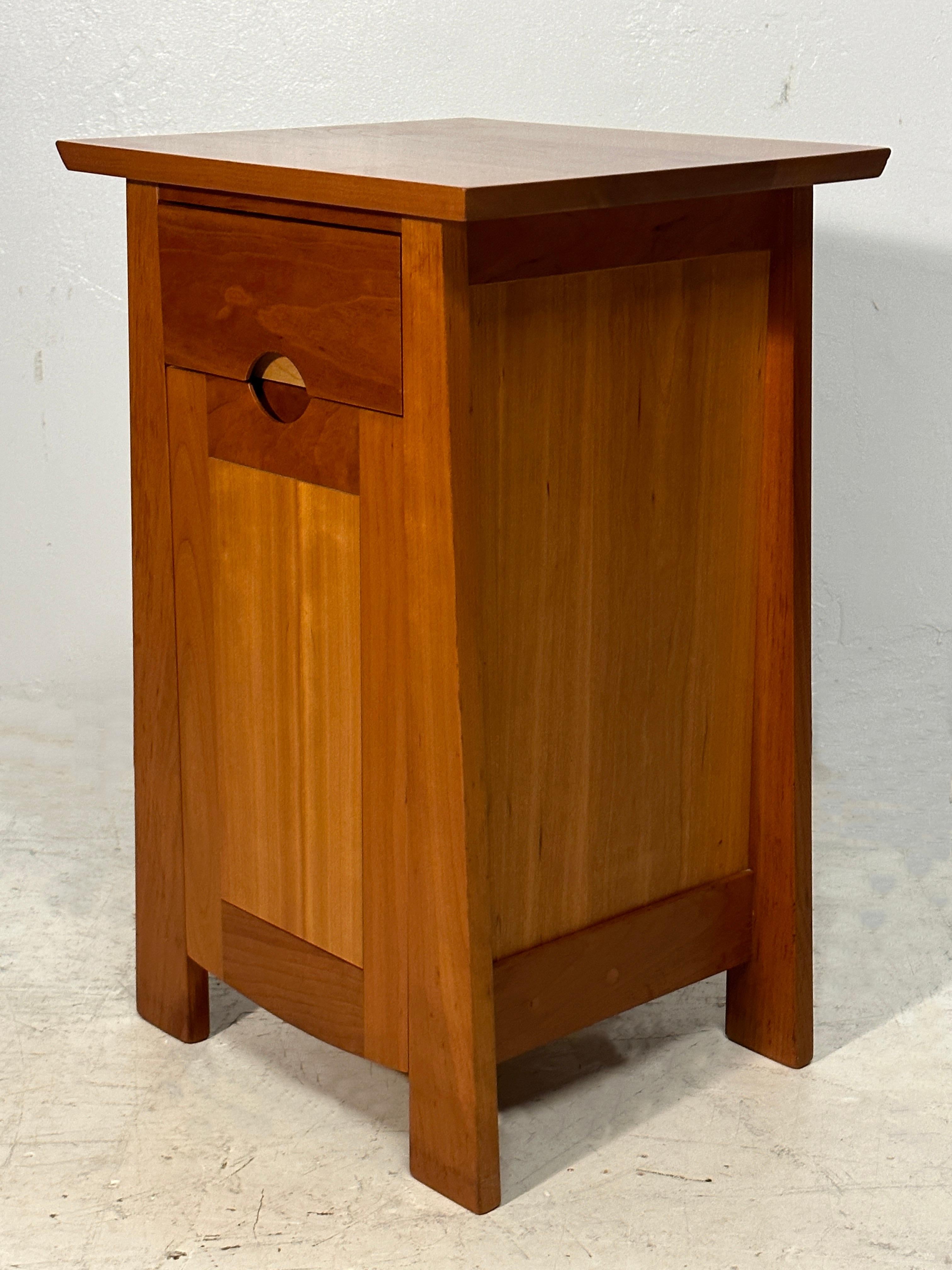 Roycroft Campus is the birthplace of the Arts & Crafts Movement in America. 
These nightstands, handcrafted by Roy-croft Renaissance are a perfect example of that period. Crafted from rich cherry wood, they embody the spirit of the new style which