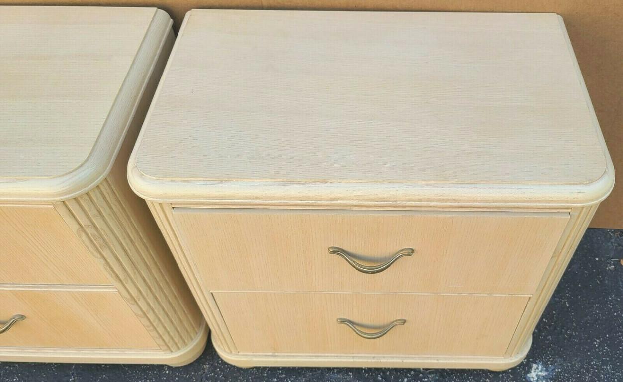 For Full item description click on continue reading at the bottom of this page.

Offering one of our recent palm beach estate fine furniture acquisitions of a pair of MCM modern contemporary Thomasville impressions light blond wood