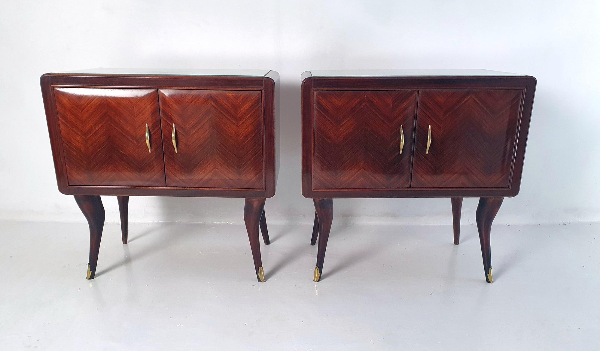 Listen up folks, I've got a pair of Italian nightstands from the 1950s that will knock your socks off! These babies are in the style of Ico Parisi and are so high quality, they practically glow in the dark! We've got them professionally restored to