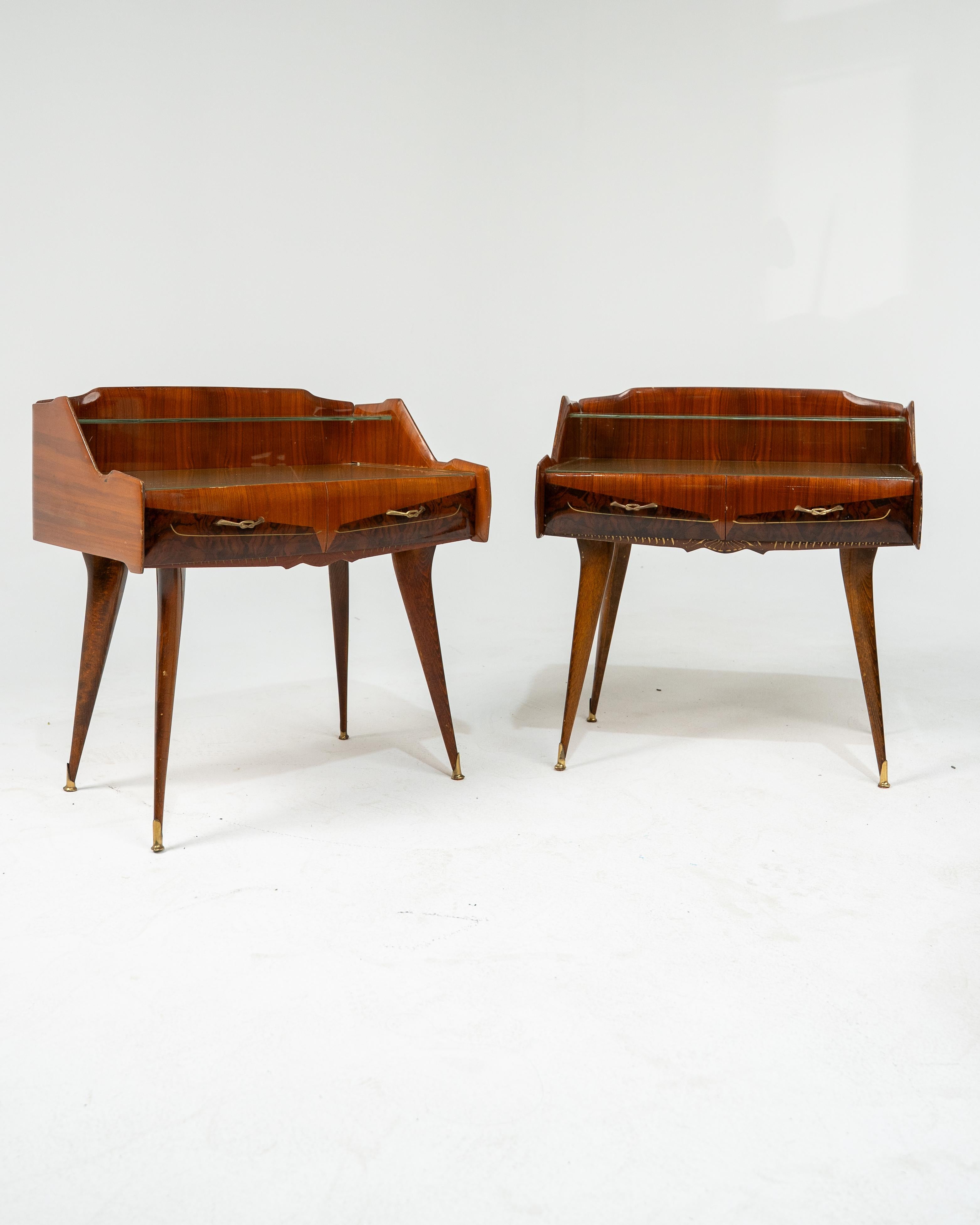 Beautiful pair of nightstands that are in a very good condition, made of wood, brass and glass. These tables are easy to combine with other furniture and you can decorate not just only a bedroom, but other rooms too. 

Tables are handcrafted, with