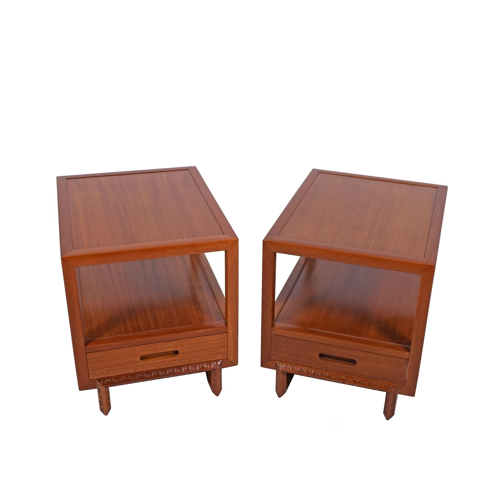 Matching pair of mahogany night tables, with one drawer and open space. Taliesen edge design. Stamped signature and red FLW mark. Made by Heritage Henredon. Signed.