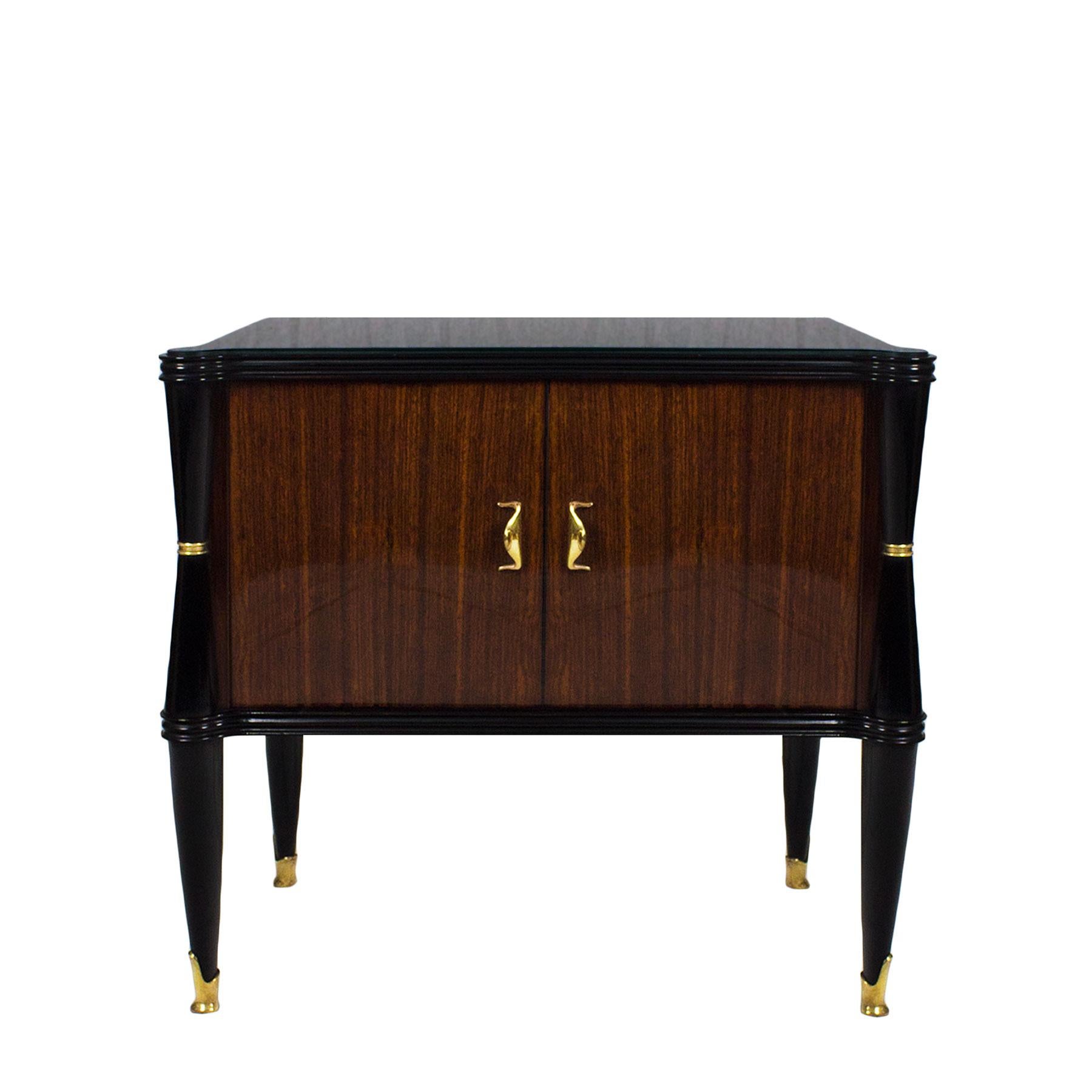 Large pair of nightstands, solid wood and mahogany veneer, stained solid mahogany stands, two doors with ash wood interior, French polish. Polished solid brass handles and feet. Black opaline on top.
In the style of Vittorio Dassi,

Italy, circa
