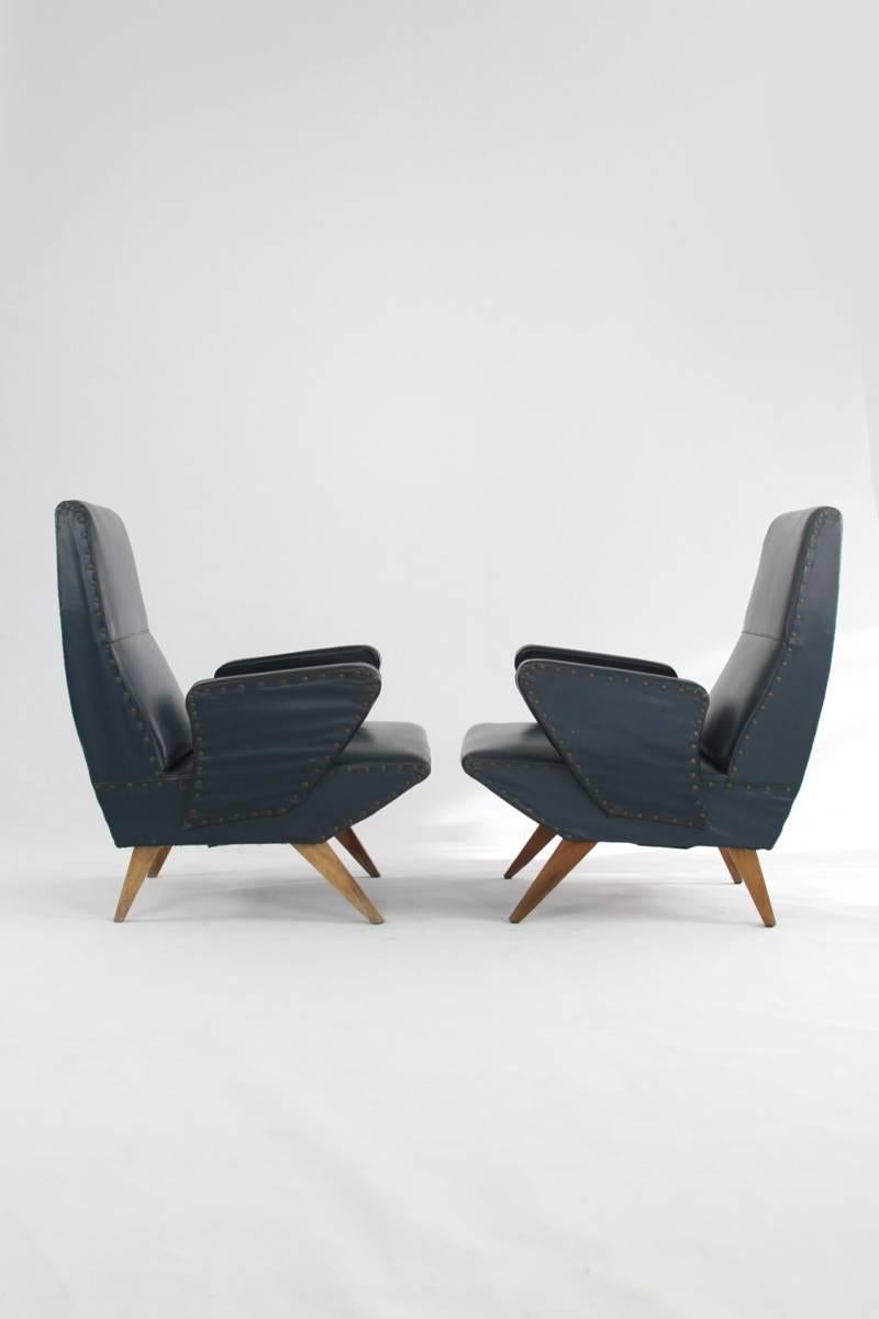 Italian Pair of Nino Zoncada Armchairs of Dark Green Imitation Leather and Wooden Legs For Sale