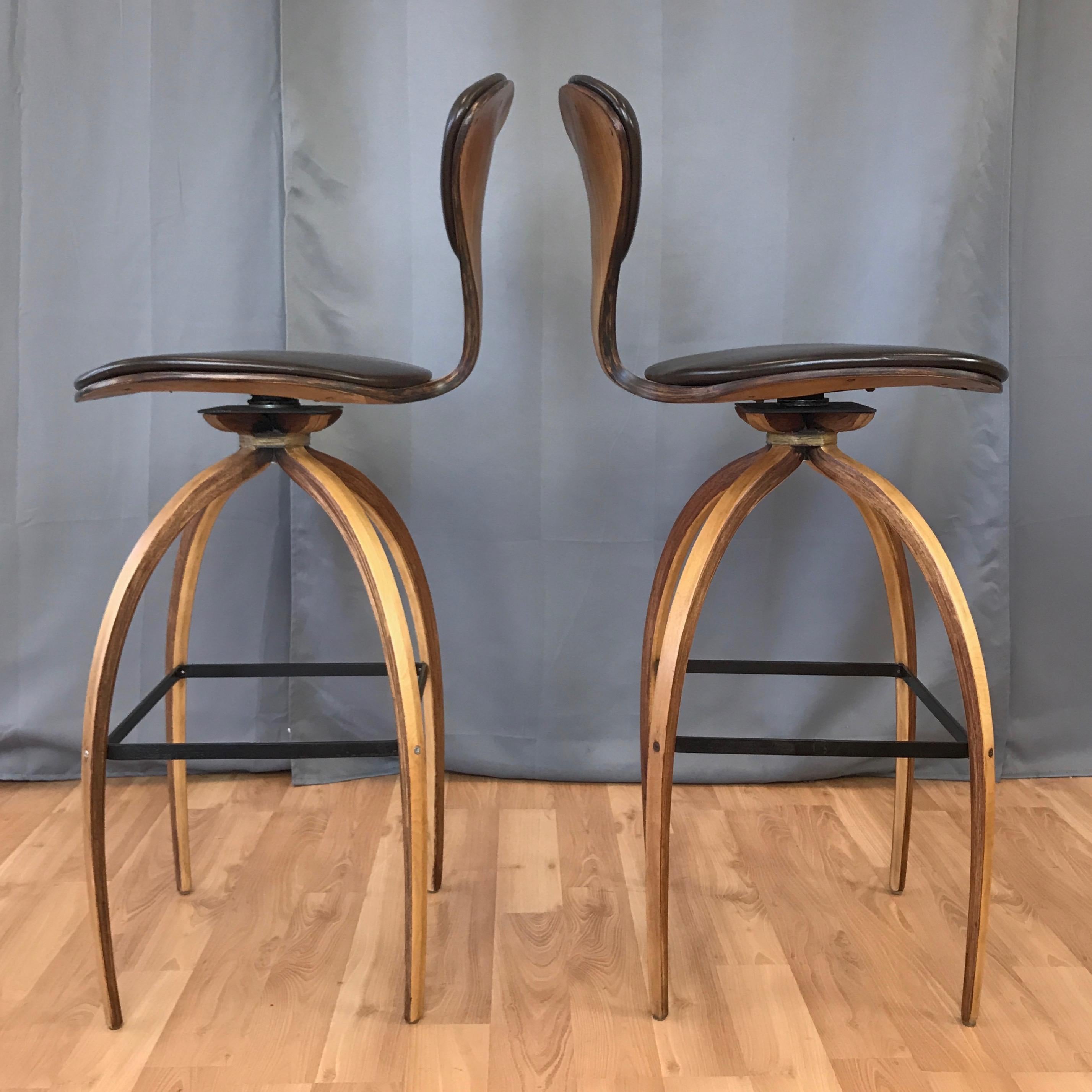 Mid-20th Century Pair of Norman Cherner for Plycraft Tall Walnut Swivel Barstools, 1960s