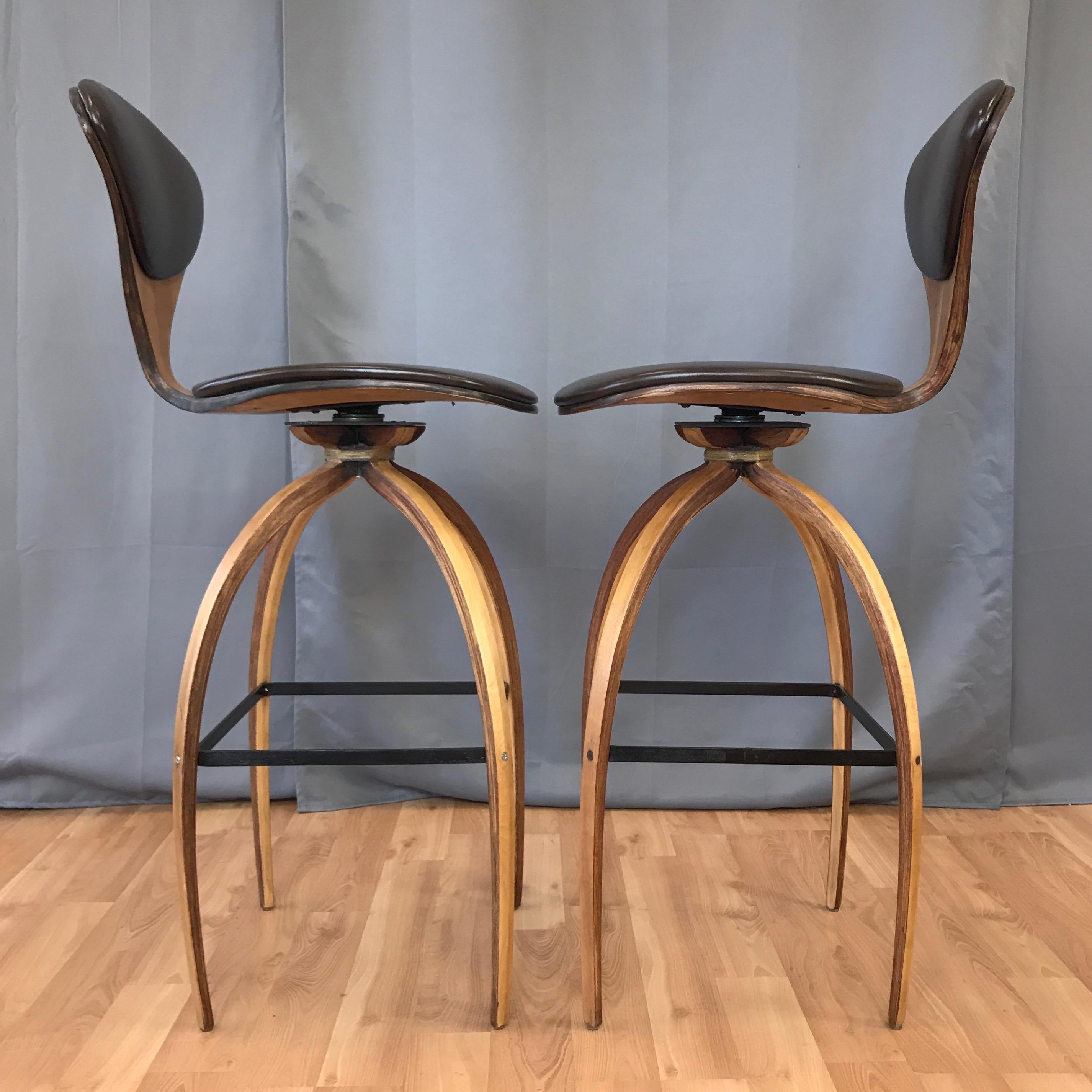 Faux Leather Pair of Norman Cherner for Plycraft Tall Walnut Swivel Barstools, 1960s