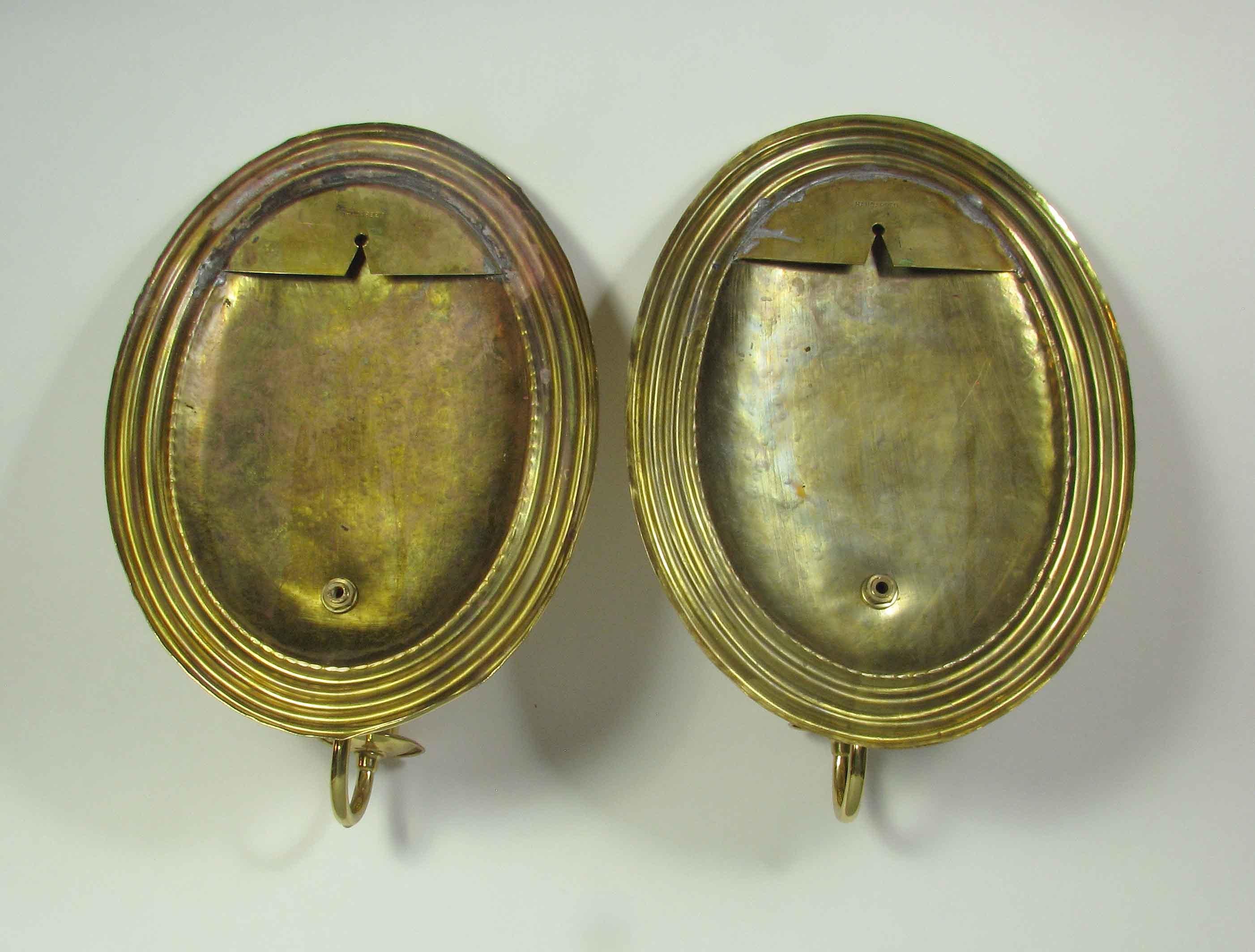 Pair of North German Repoussé Brass Wall Sconces In Good Condition In Ottawa, Ontario