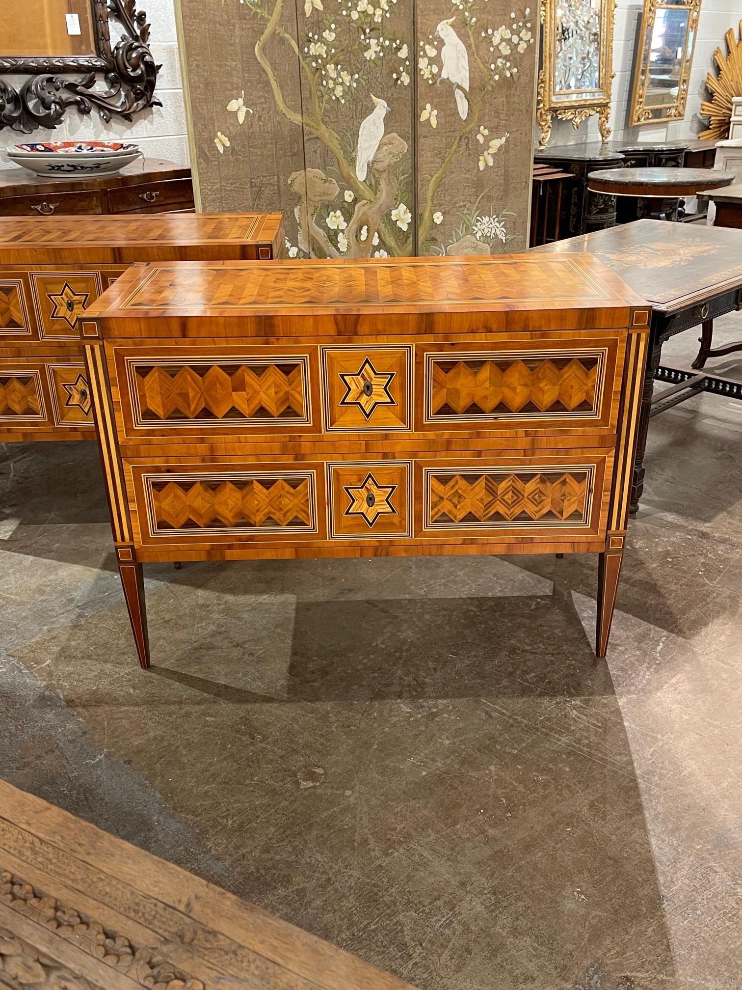 Very fine pair of Northern Italian walnut commodes with star inlay as well as an interesting 3 D like pattern.
The finish on these is also exceptional. Superb!!