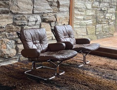 Pair of Norwegian leather and chrome Harald Relling lounge chairs for Westnofa