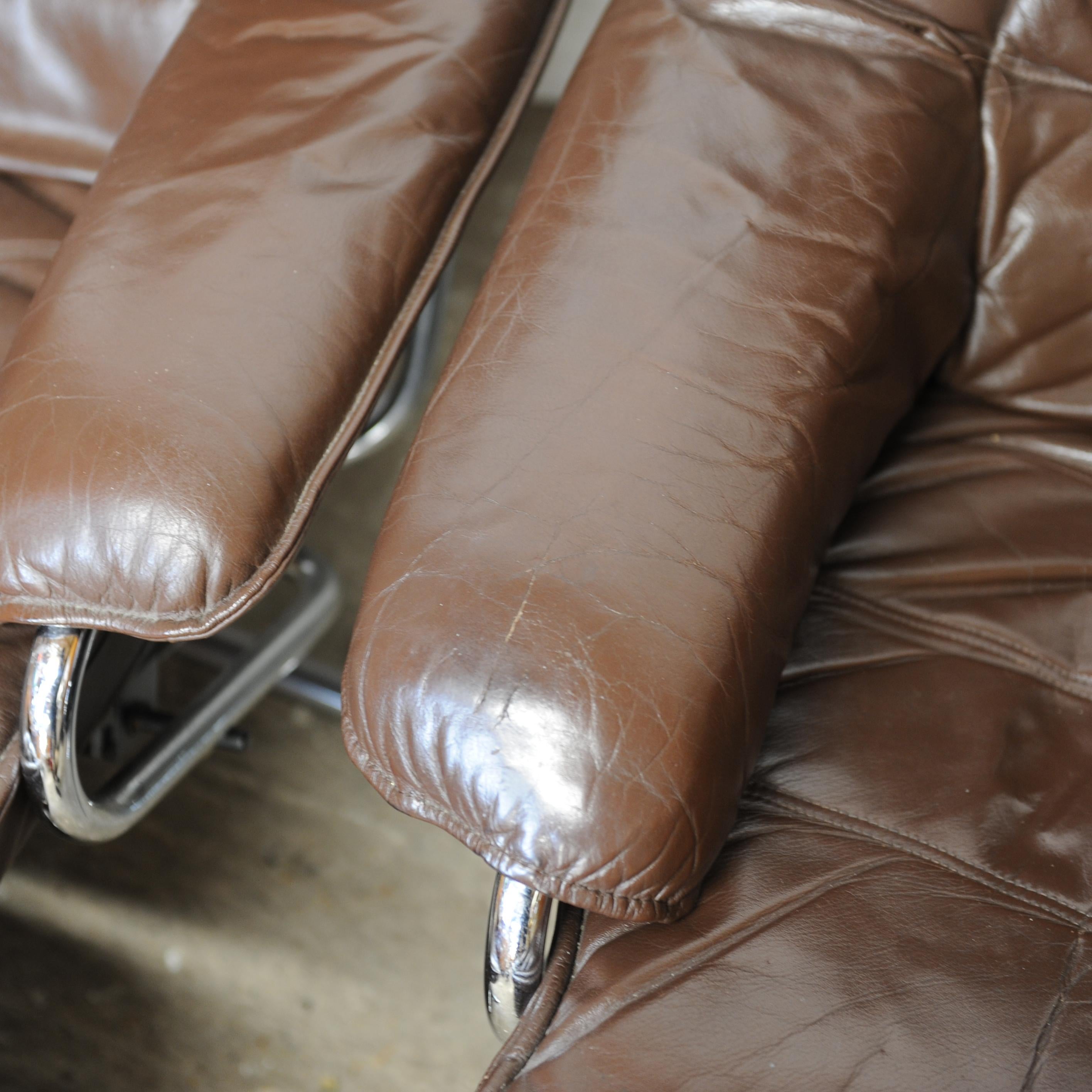 Pair of Norwegian Lounge Chairs with Footstools in Brown Leather by Skoghaus For Sale 1