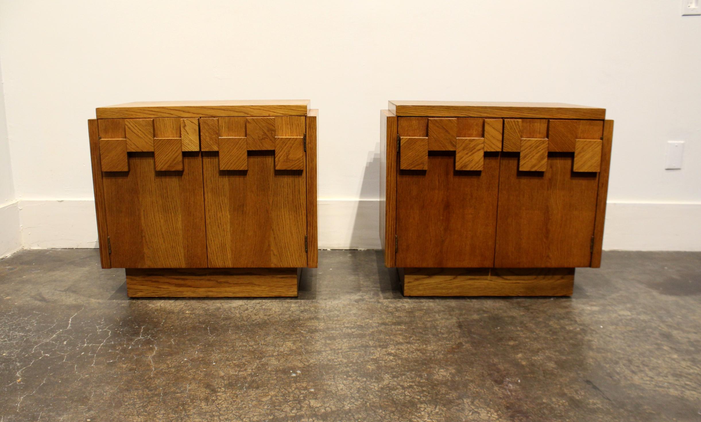 Part of Lane Furniture's Classic 1970s Brutalist bedroom set. Heavy wood mosaic on front doors. Doors swing open to reveal interior shelving. Whole set is available.
  