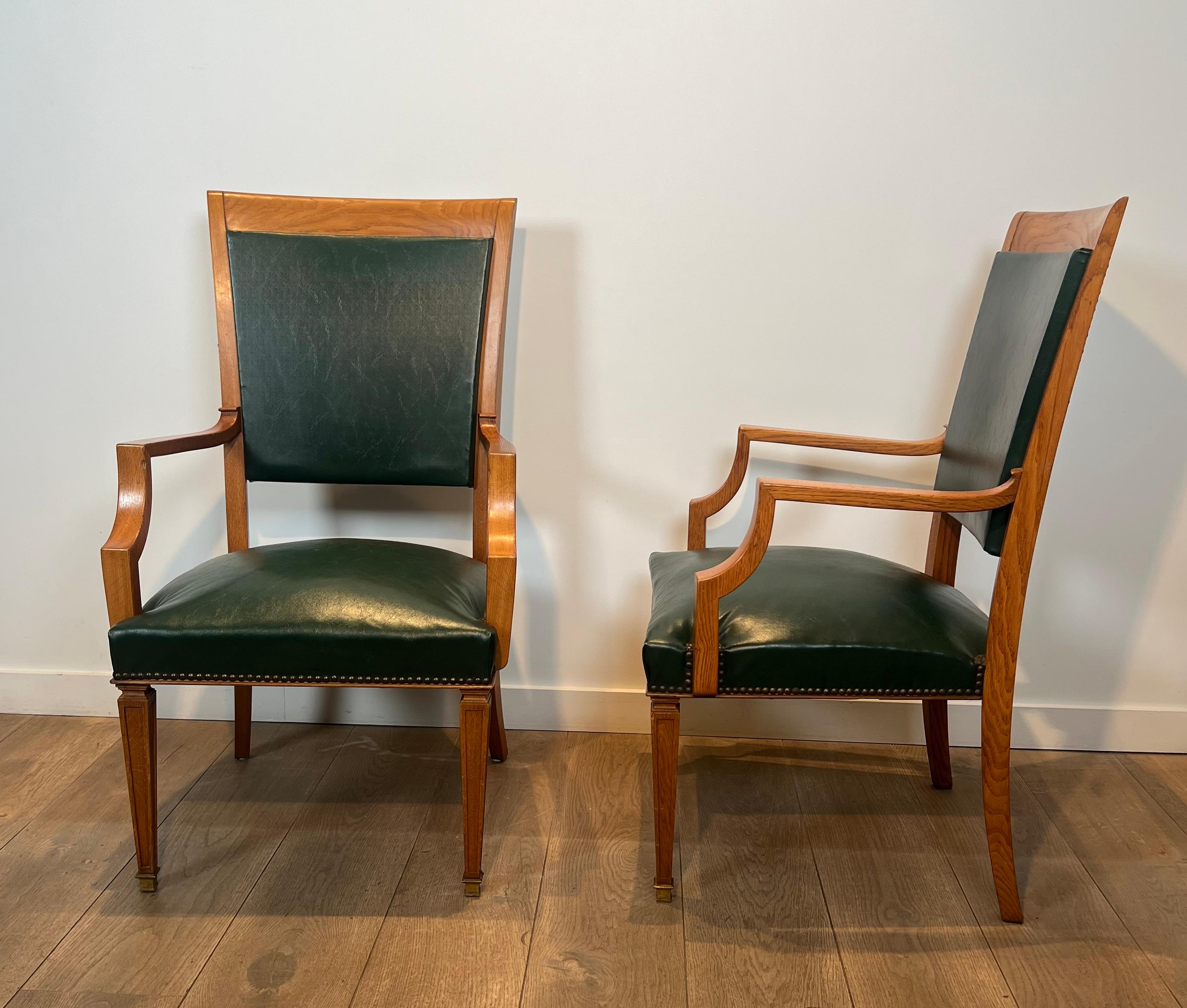 Neoclassical Pair of Oak and Leather Armchairs by  De Coene Frères For Sale
