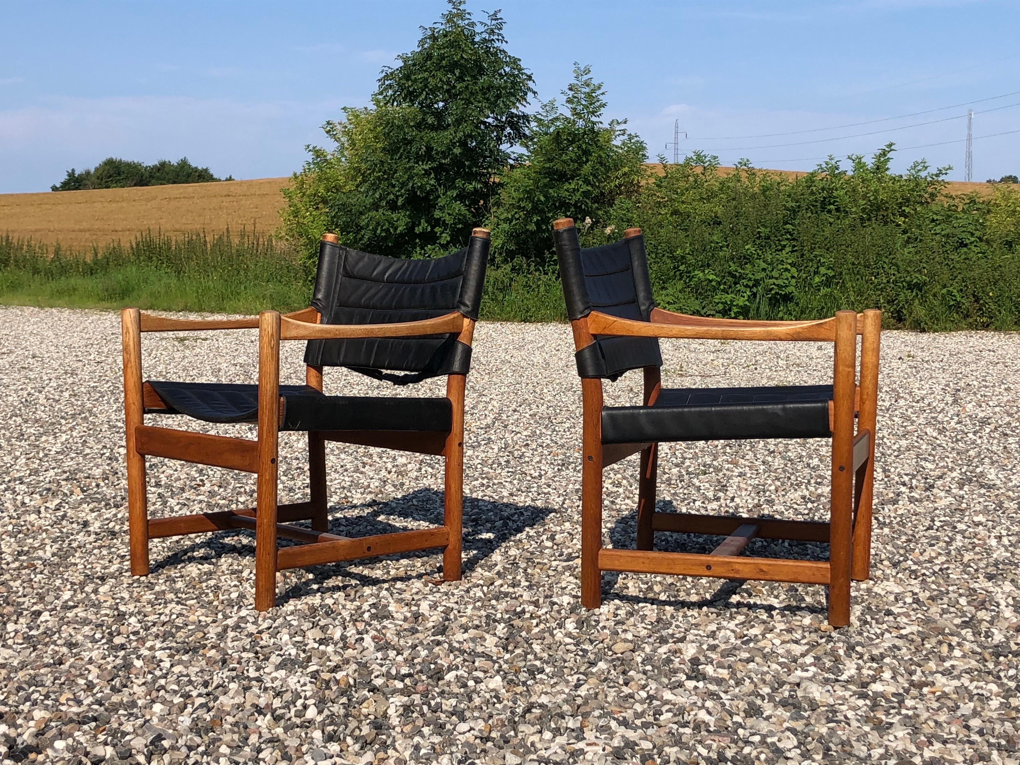 Pair of oak and leather armchairs by Ditte and Adrian Heath for FDB Denmark In Fair Condition For Sale In Vejle Øst, DK