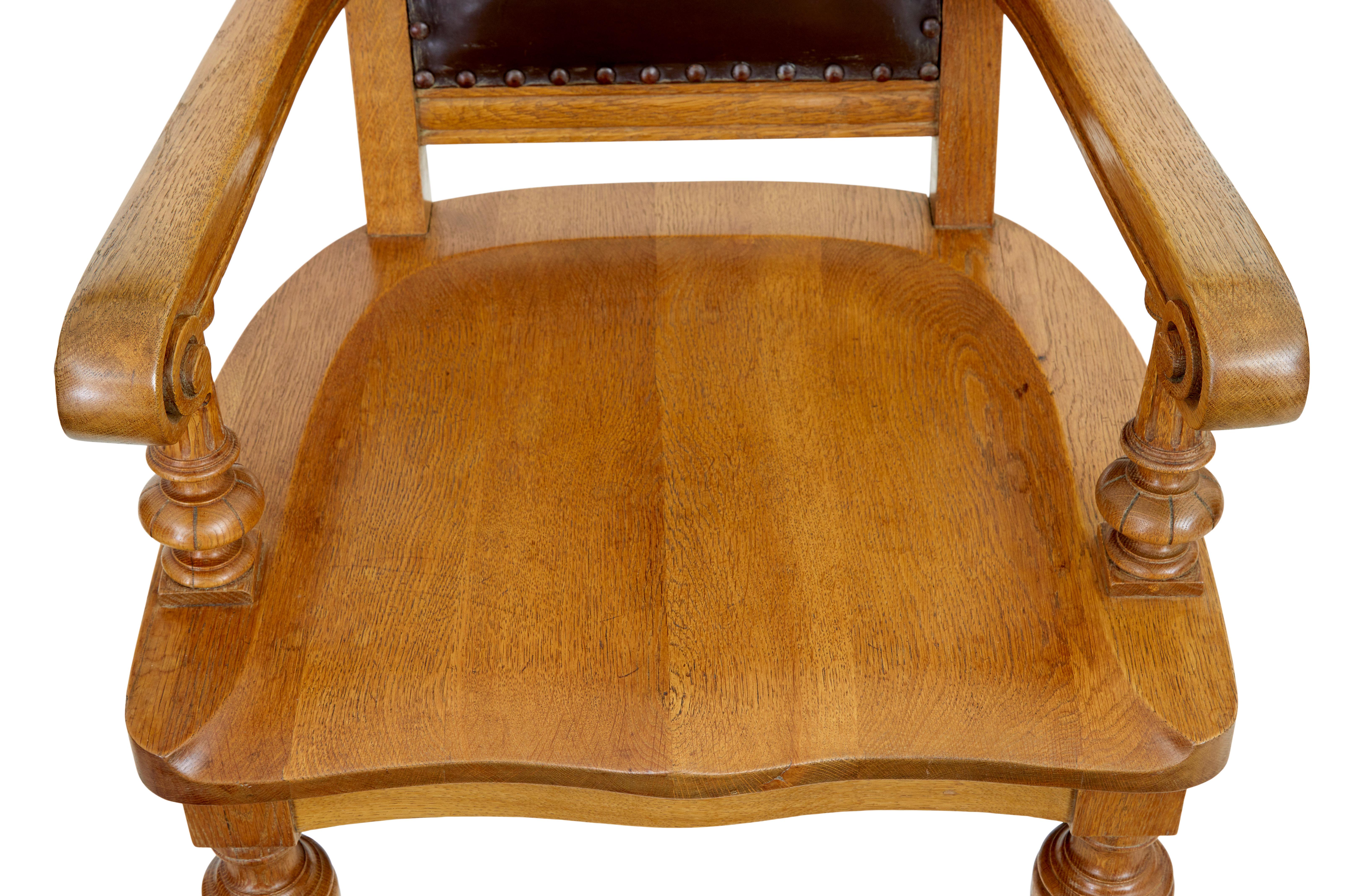 Arts and Crafts Pair of oak and leather arts and crafts library chairs