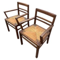 Paire de fauteuils en chêne et paille " René Gabriel
