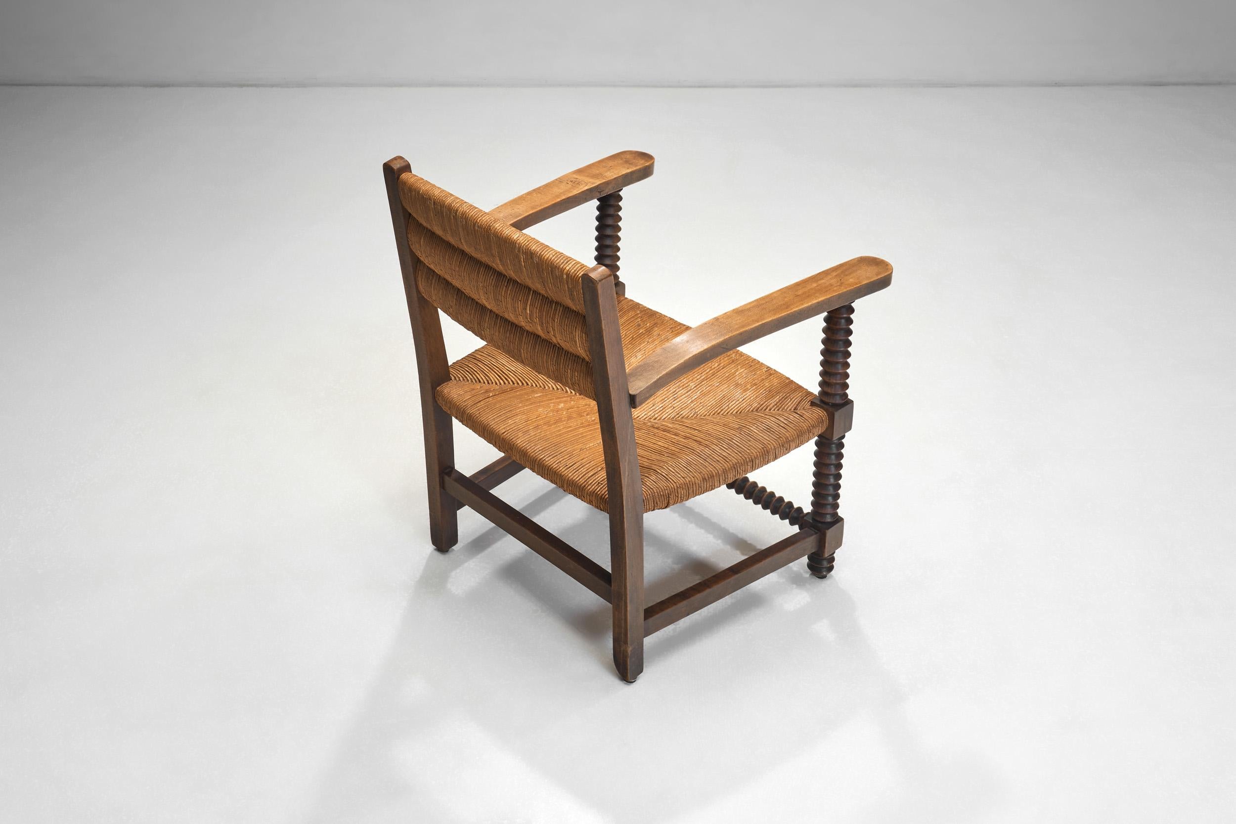 Mid-20th Century Pair of Oak and Woven Rush Chairs in the Manner of Charles Dudouyt, France 1940s For Sale