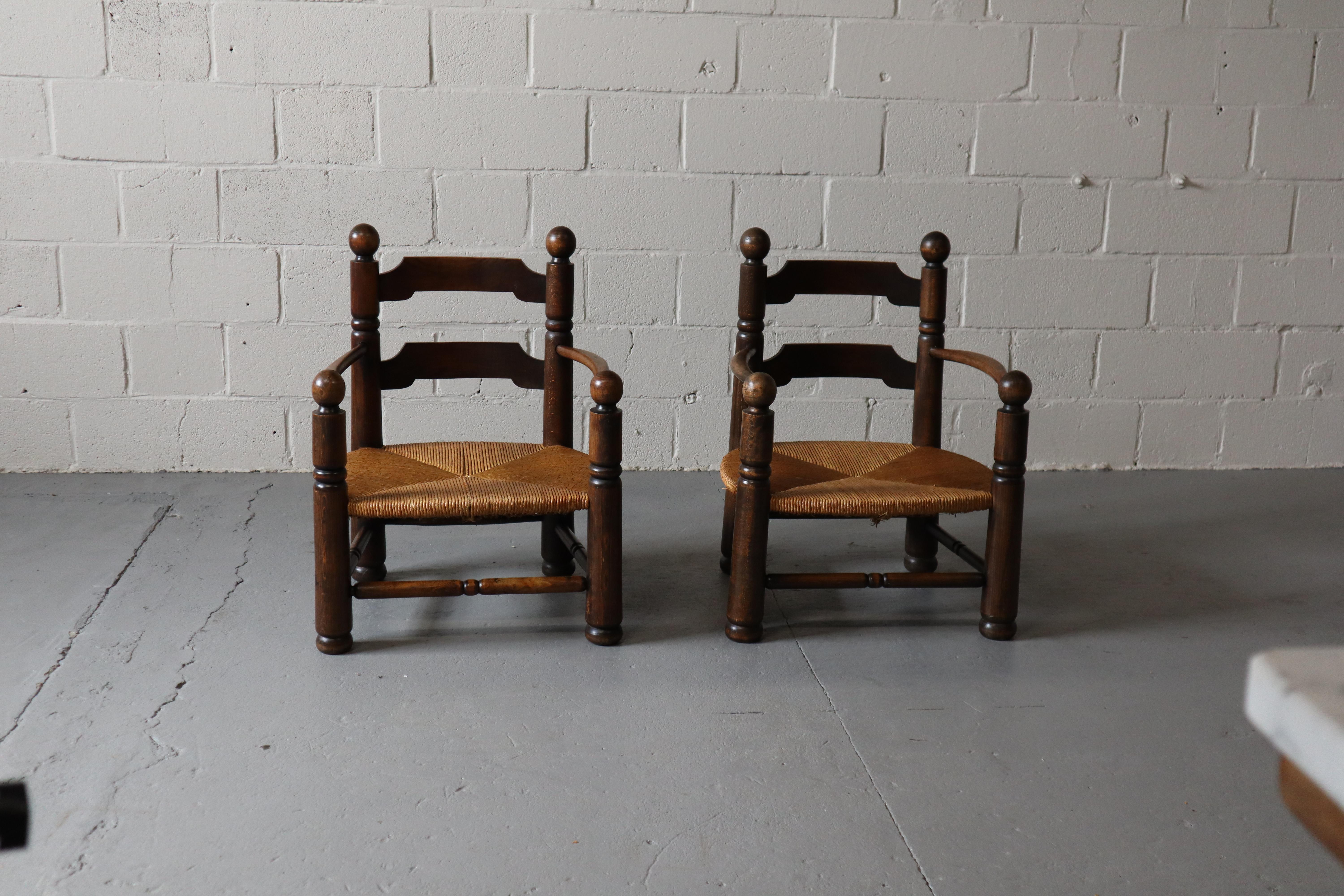 Art Deco Pair of oak armchairs by Charles Dudouyt, 1940's For Sale