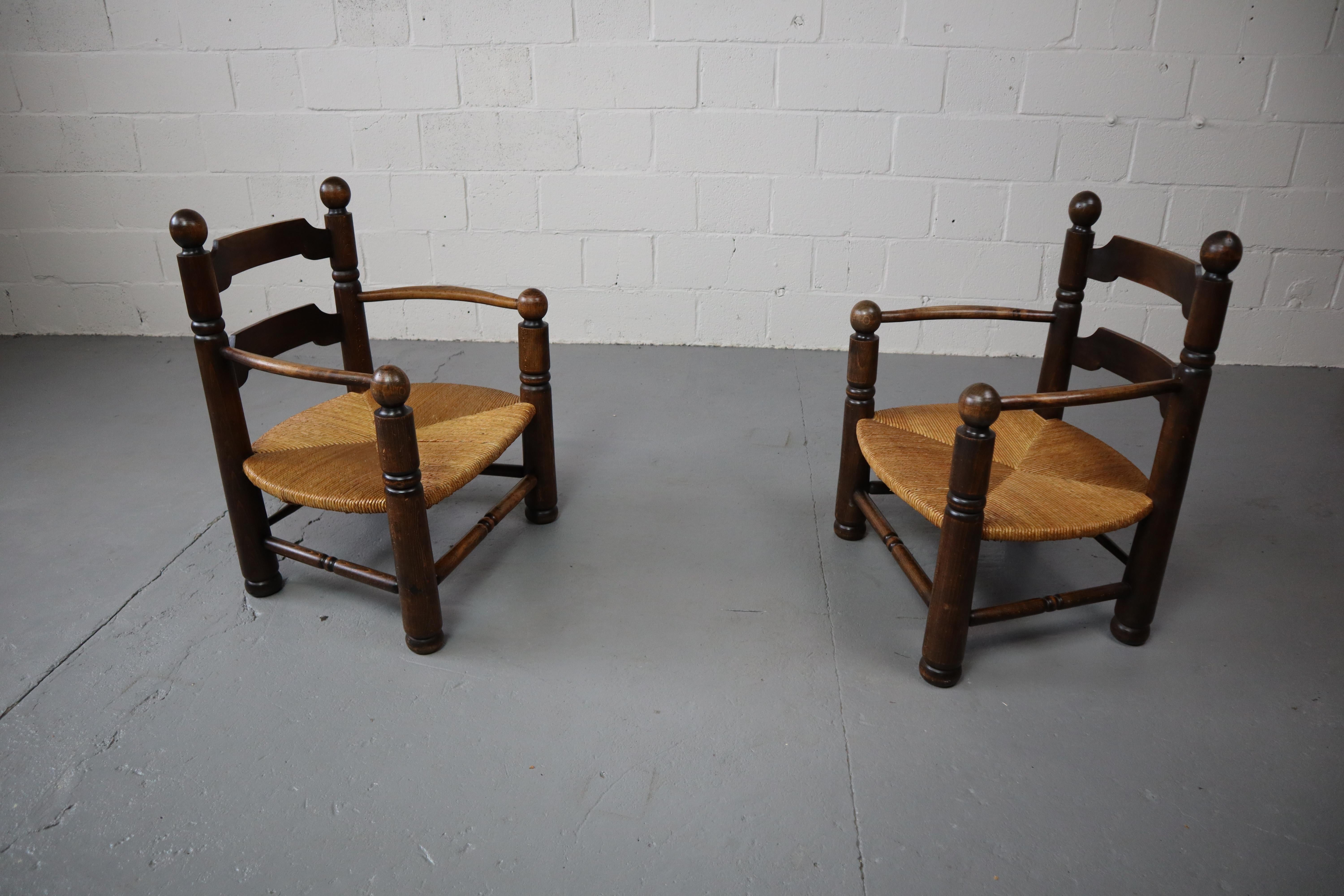 French Pair of oak armchairs by Charles Dudouyt, 1940's For Sale