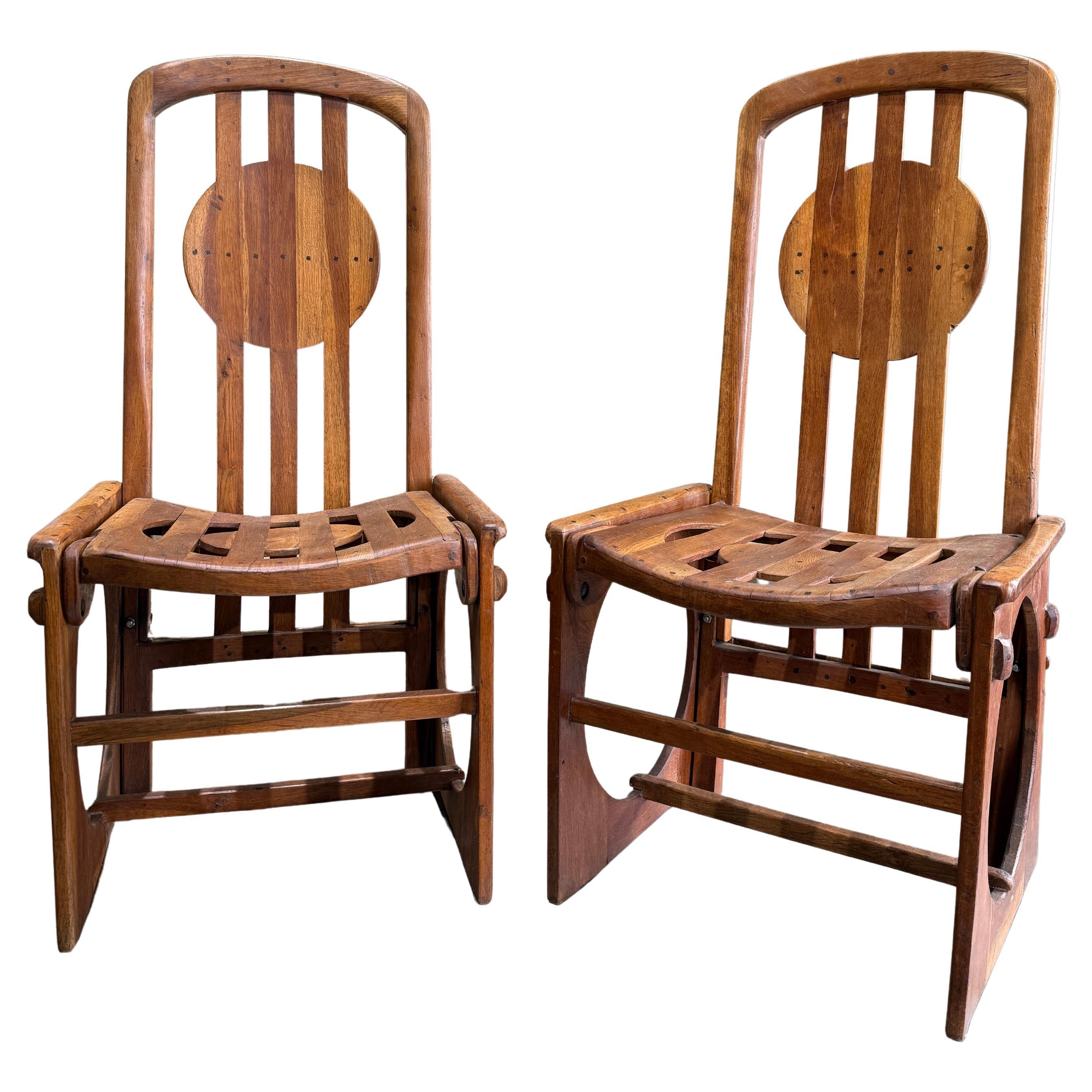 Pair of oak armchairs Italy 1950