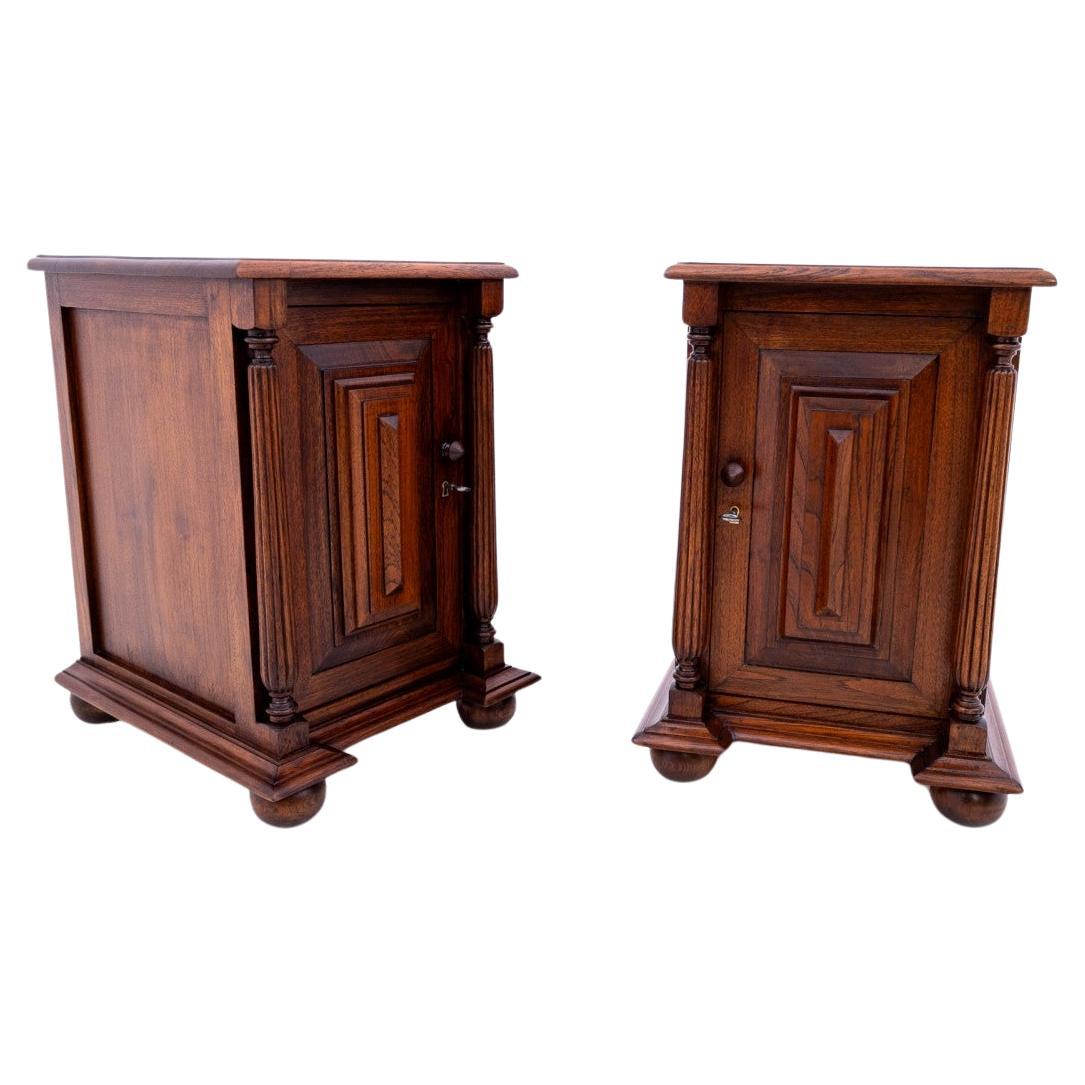 Pair of oak bedside tables, France, circa 1920. For Sale
