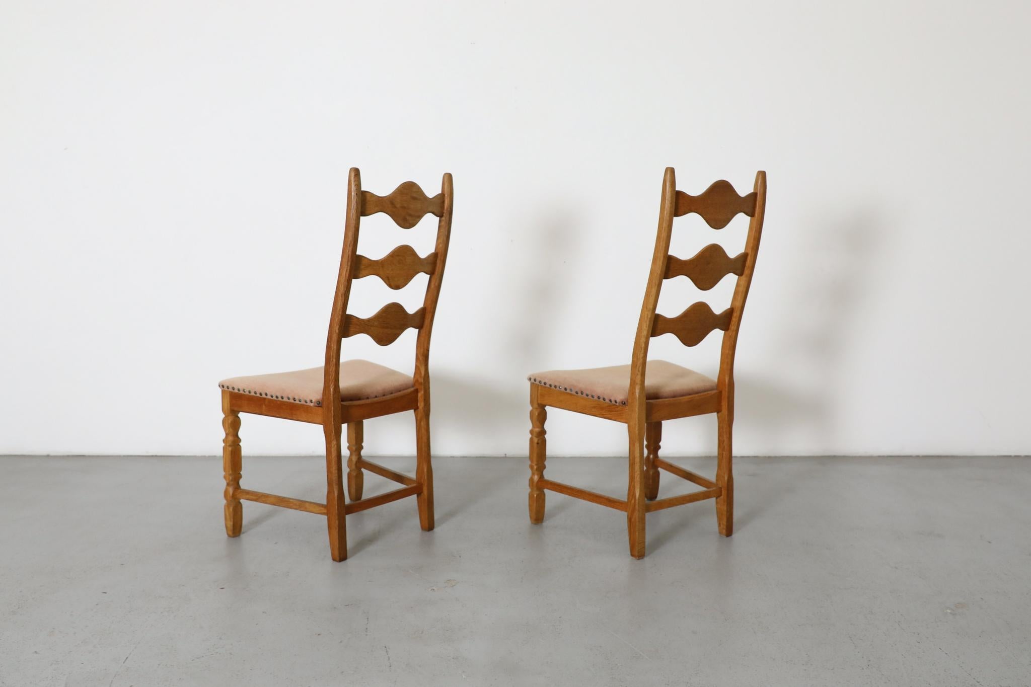 Pair of Oak Decorative Back Dining Chairs by Henning Kjaernulf In Good Condition For Sale In Los Angeles, CA