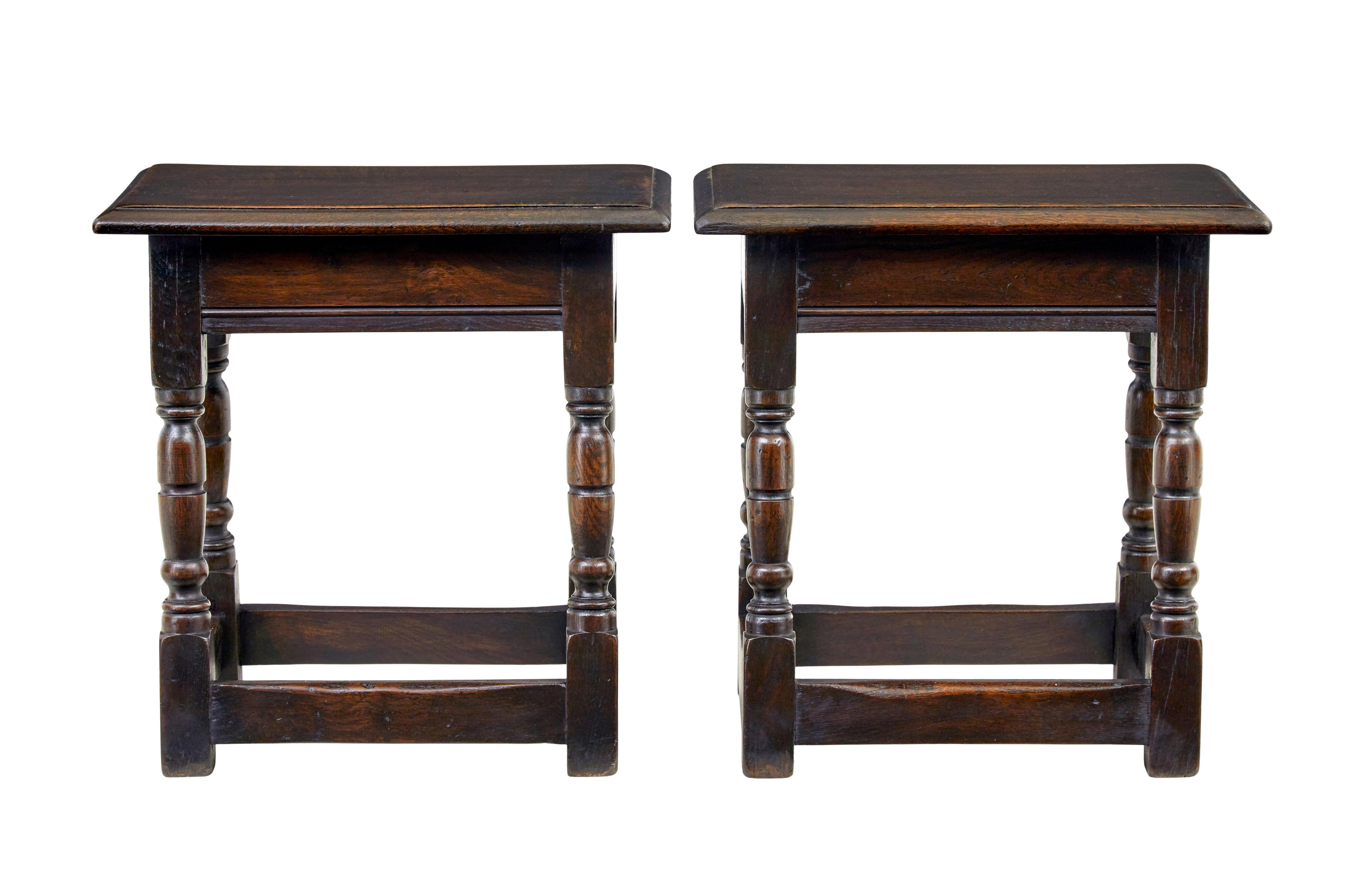 Pair of oak English made joint stools circa 1990.

Good quality pair of joint stools made from solid oak, over sailing top each supported by 4 turned legs, united by a near floor level stretcher.  Can be used as stools but also ideal for side, lamp