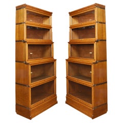 Pair of oak globe Wernicke five section bookcases