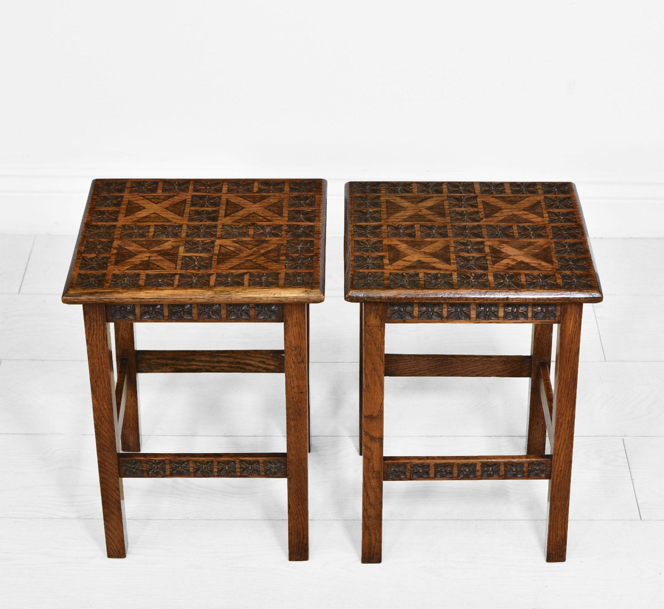 A fabulous and quite rare pair of oak stools from HM The Queen's Carving School at Sandringham. Circa 1945.

Free U.K. shipping.

Overall they are in very good condition, and have been cleaned and waxed. Both are very sturdy in structure with no