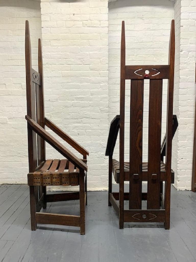 Pair of Oak High Back Mission Chairs in the Style of Charles Rohlfs For