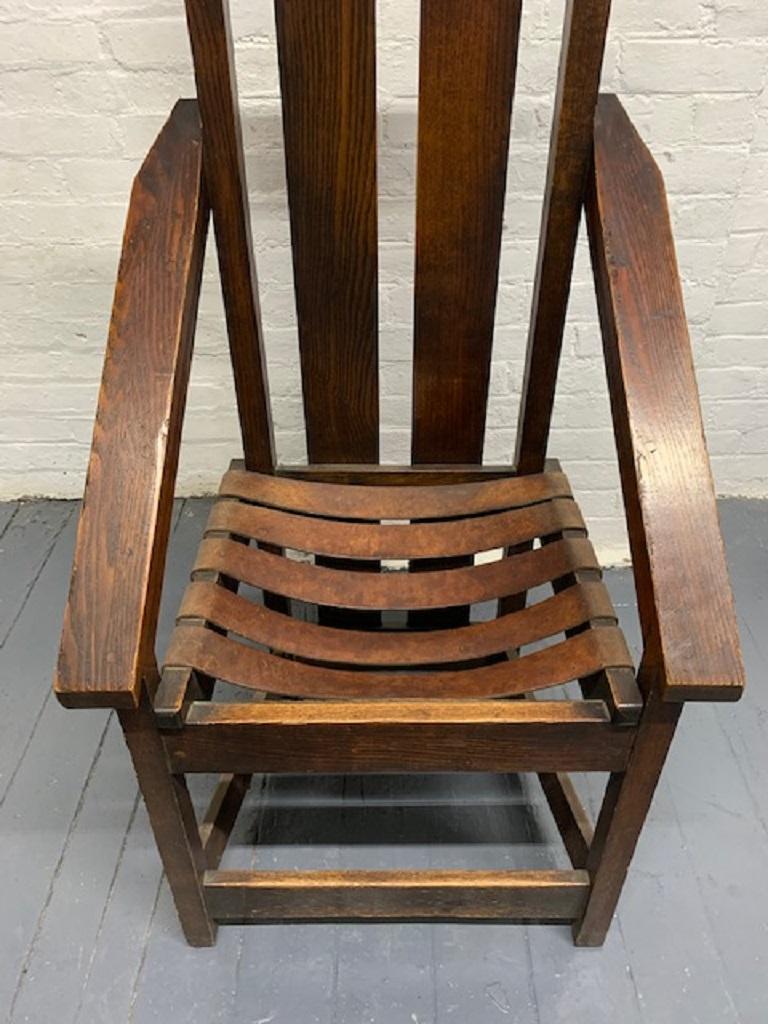 Pair of Oak High Back Mission Chairs in the Style of Charles Rohlfs For