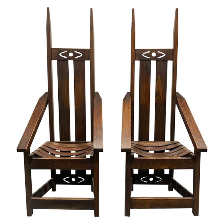 Pair of Oak High Back Mission Chairs in the Style of Charles Rohlfs