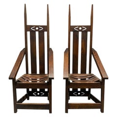 Pair of Oak High Back Mission Chairs in the Style of Charles Rohlfs