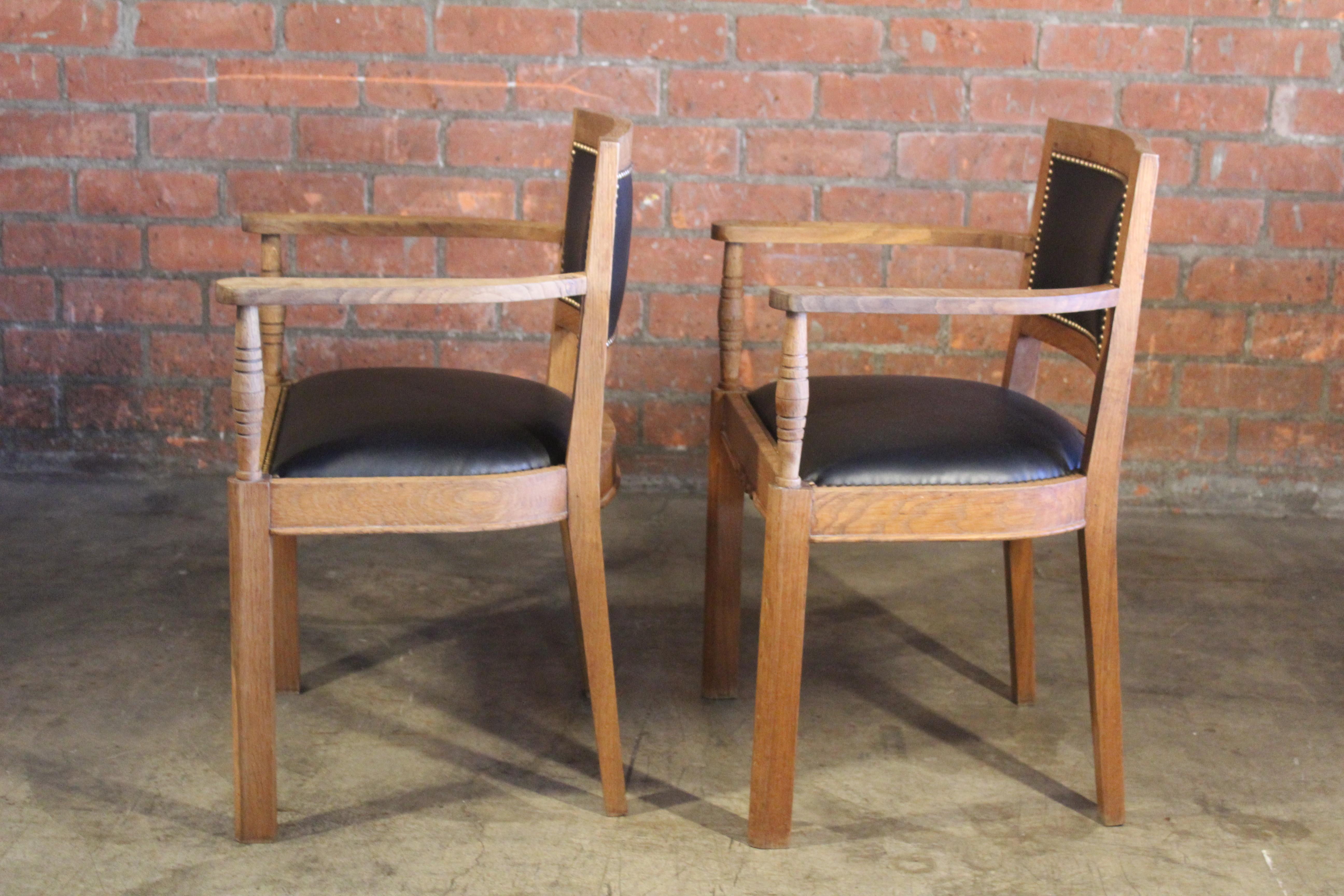 Mid-20th Century Pair of Oak & Leather Armchairs Attributed to Charles Dudoyt, France, 1940s