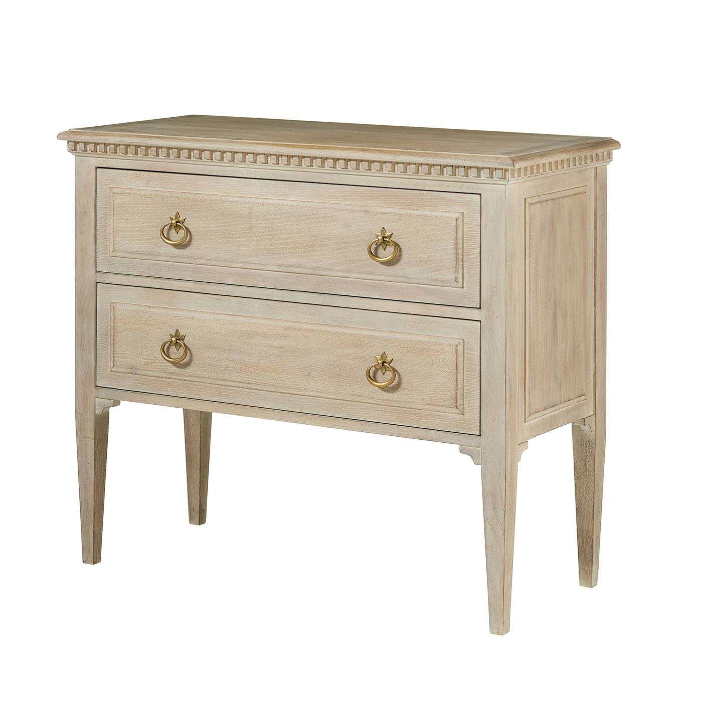 The piece showcases exquisite period details including carved dentil molding along the crown, square tapered legs, and classically proportioned drawer fronts. Each element has been thoughtfully executed to honor traditional Louis XVI craftsmanship,