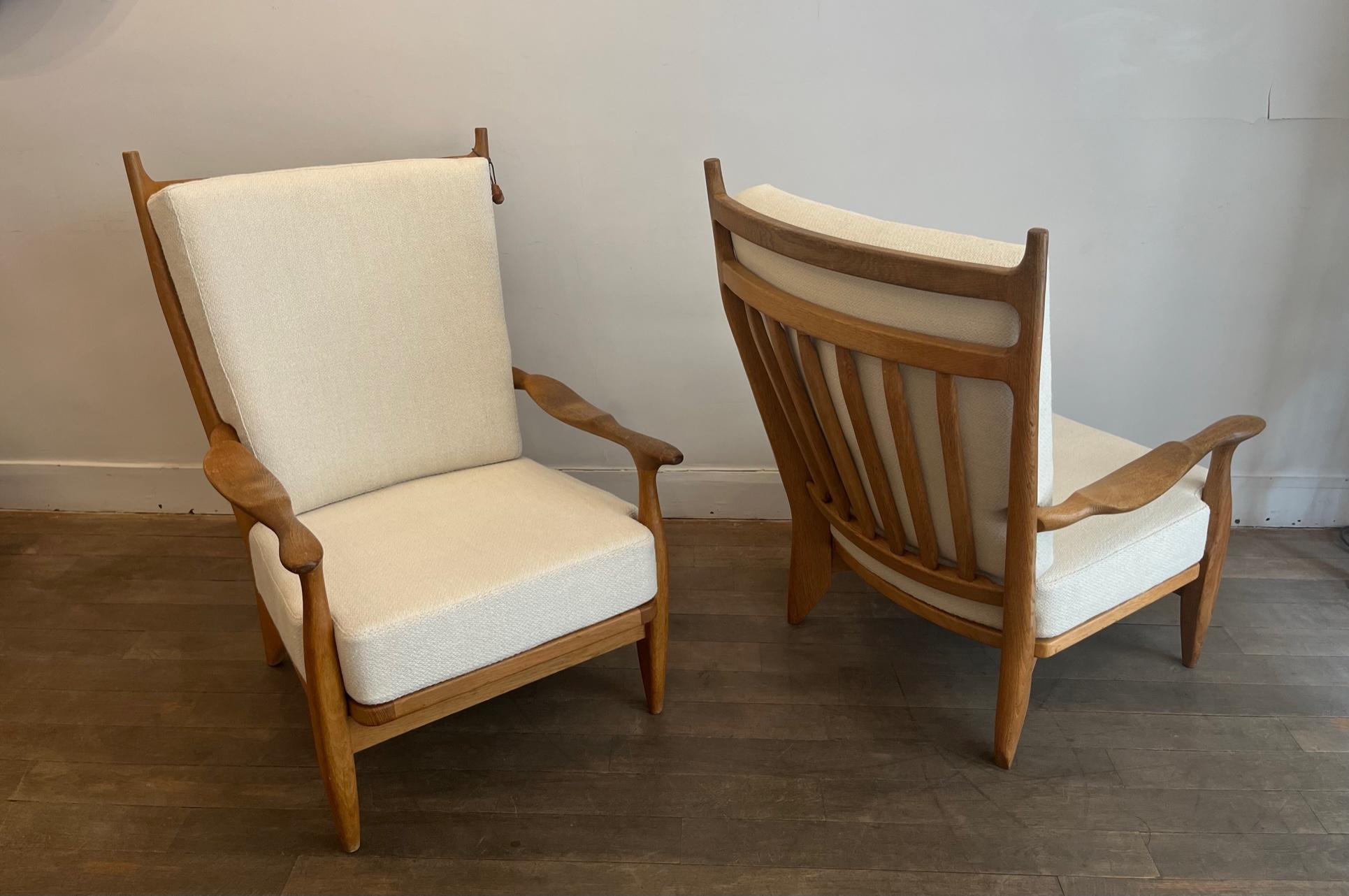 Pair of large oak lounge chairs 
Model: 