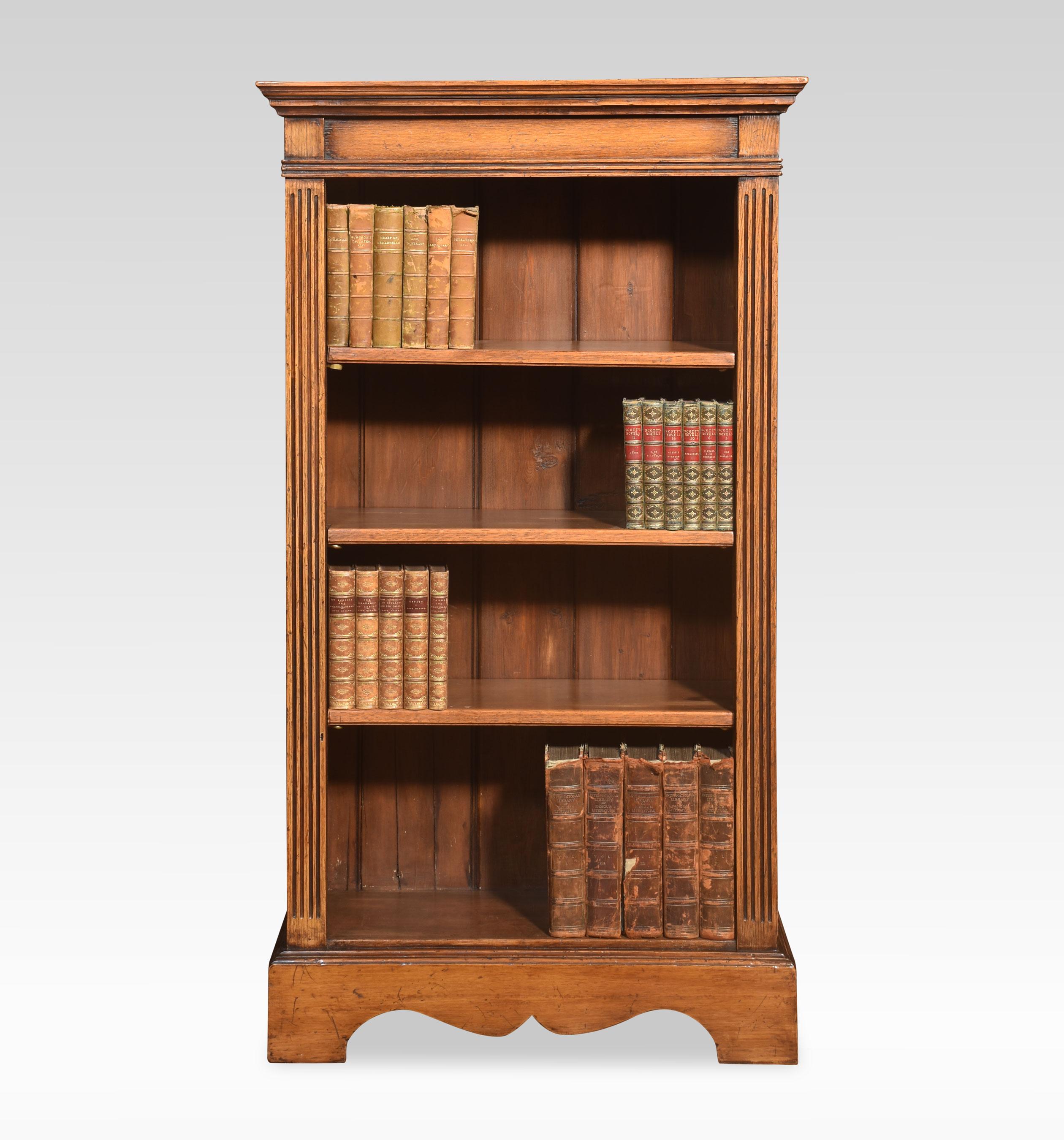 Pair of oak open bookcases, the rectangular top above moulded edge. To the adjustable shelved interior flanked by reeded columns. All raised on a plinth base.
Dimensions
Height 51.5 Inches
Width 28.5 Inches
Depth 11 Inches