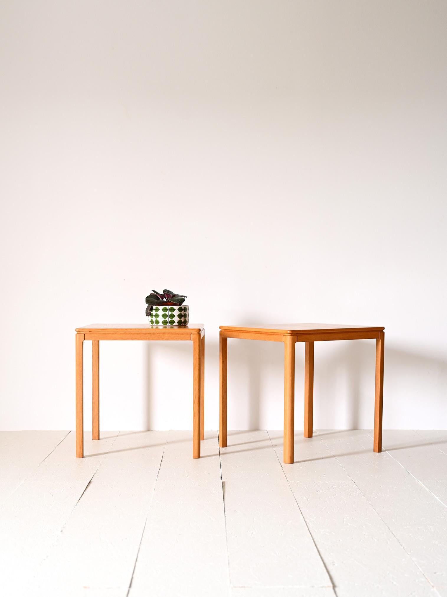 Scandinavian 1960s sofa tables.

Modern furniture pieces with a minimalist design, suitable for inclusion in rooms with a contemporary style.
Consisting of a large square table top with rounded corners and long legs that slender the figure.
Thanks