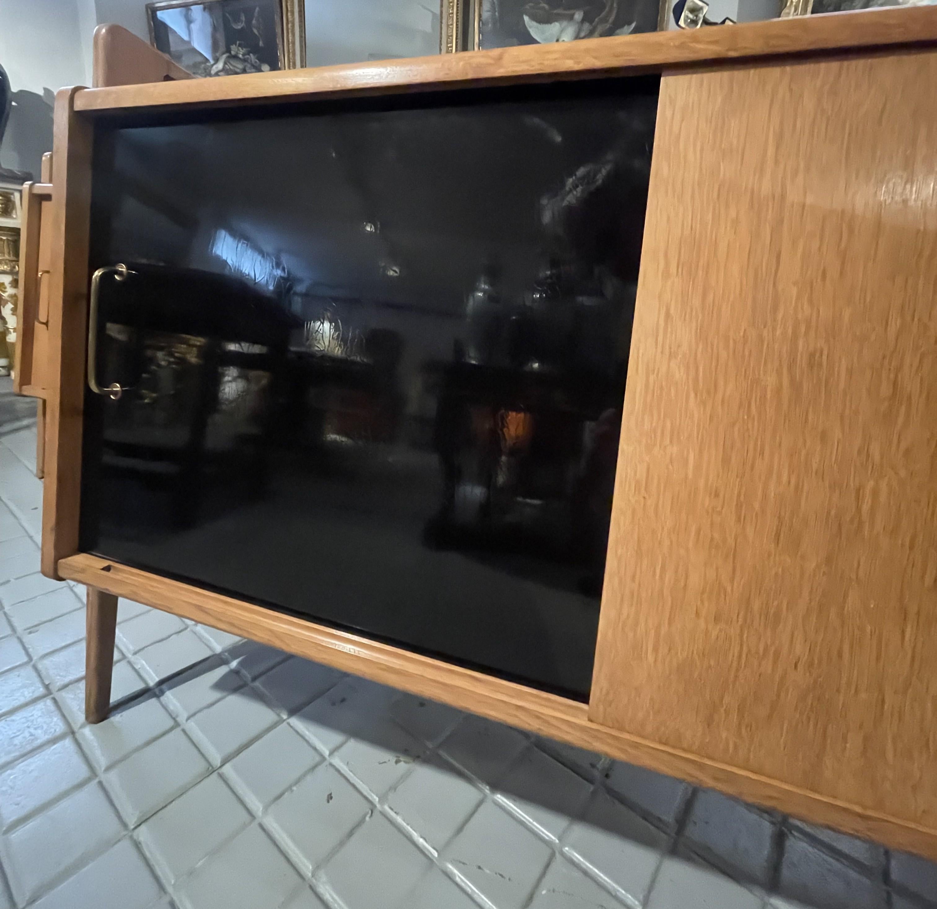 Pair of oak sideboards with sloping front, sliding doors, one of them lacquered For Sale 4