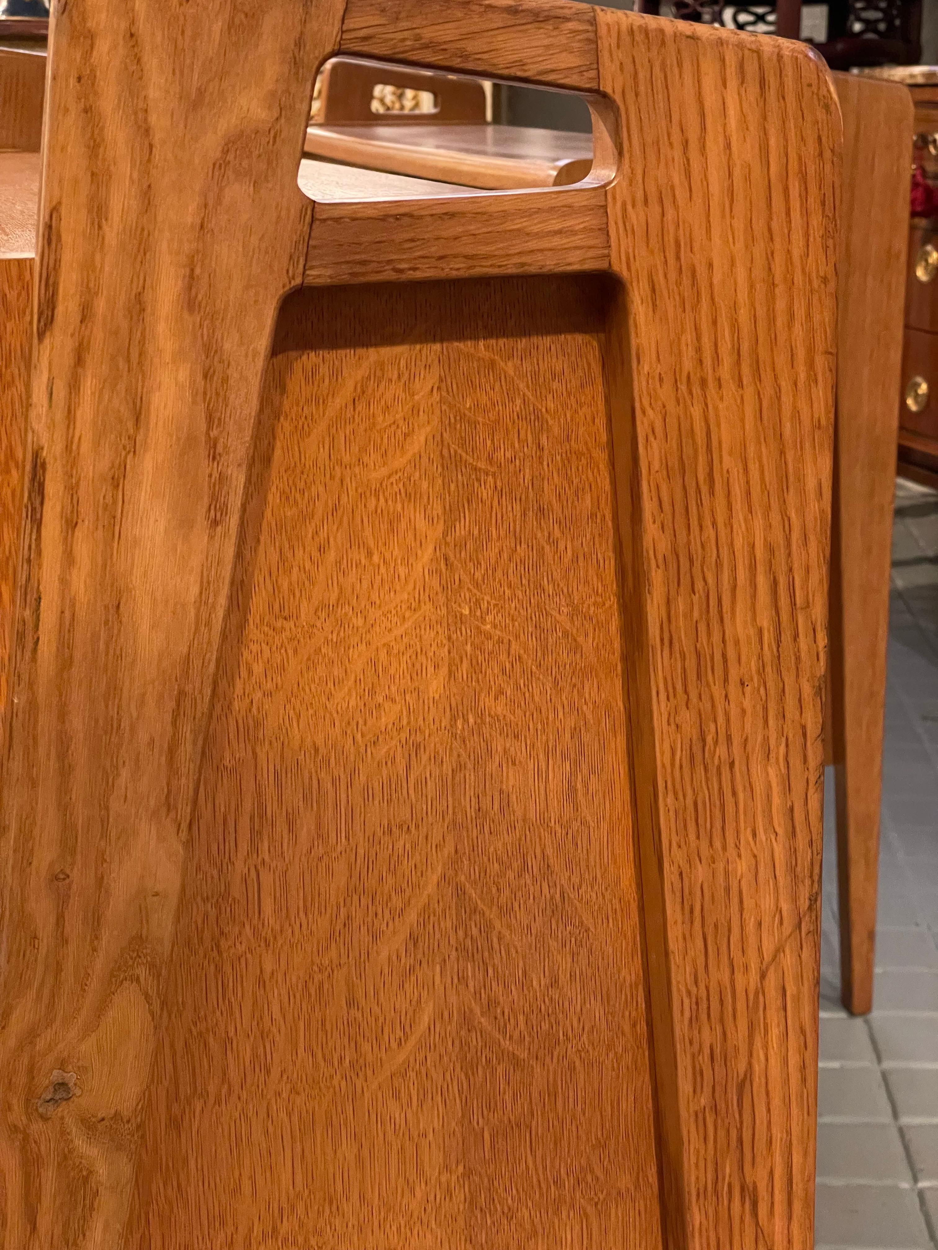 Pair of oak sideboards with sloping front, sliding doors, one of them lacquered For Sale 6