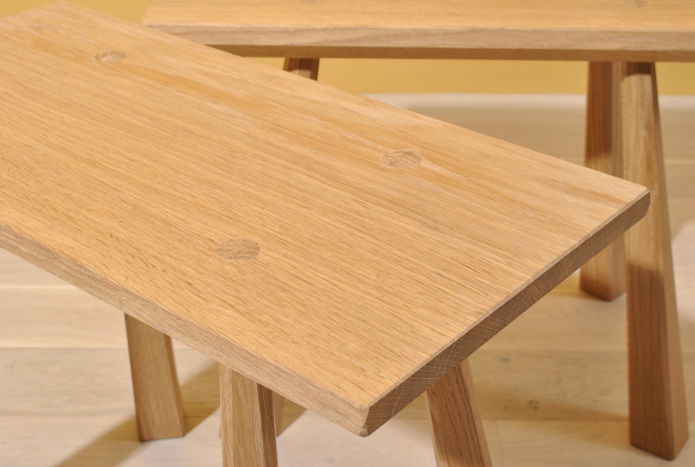 Handcrafted English oak staked legged single seater benches.
This pair of resilient and striking benches are made to typical dining seat height but can be utilised in many other scenarios.
Much of the work is characterised by their predominant use