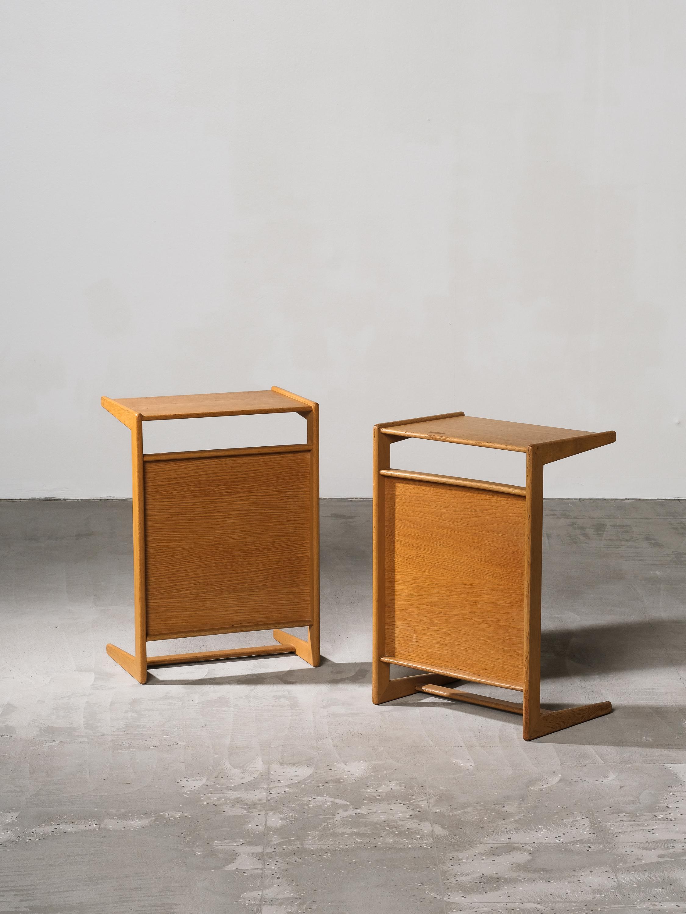 Pair of side tables from the Triva series designed by Yngvar Sandström for Nordiska Kompaniet. They both have a metal company label. They can be used as side tables or as bedside tables (positioned horizontally or vertically).