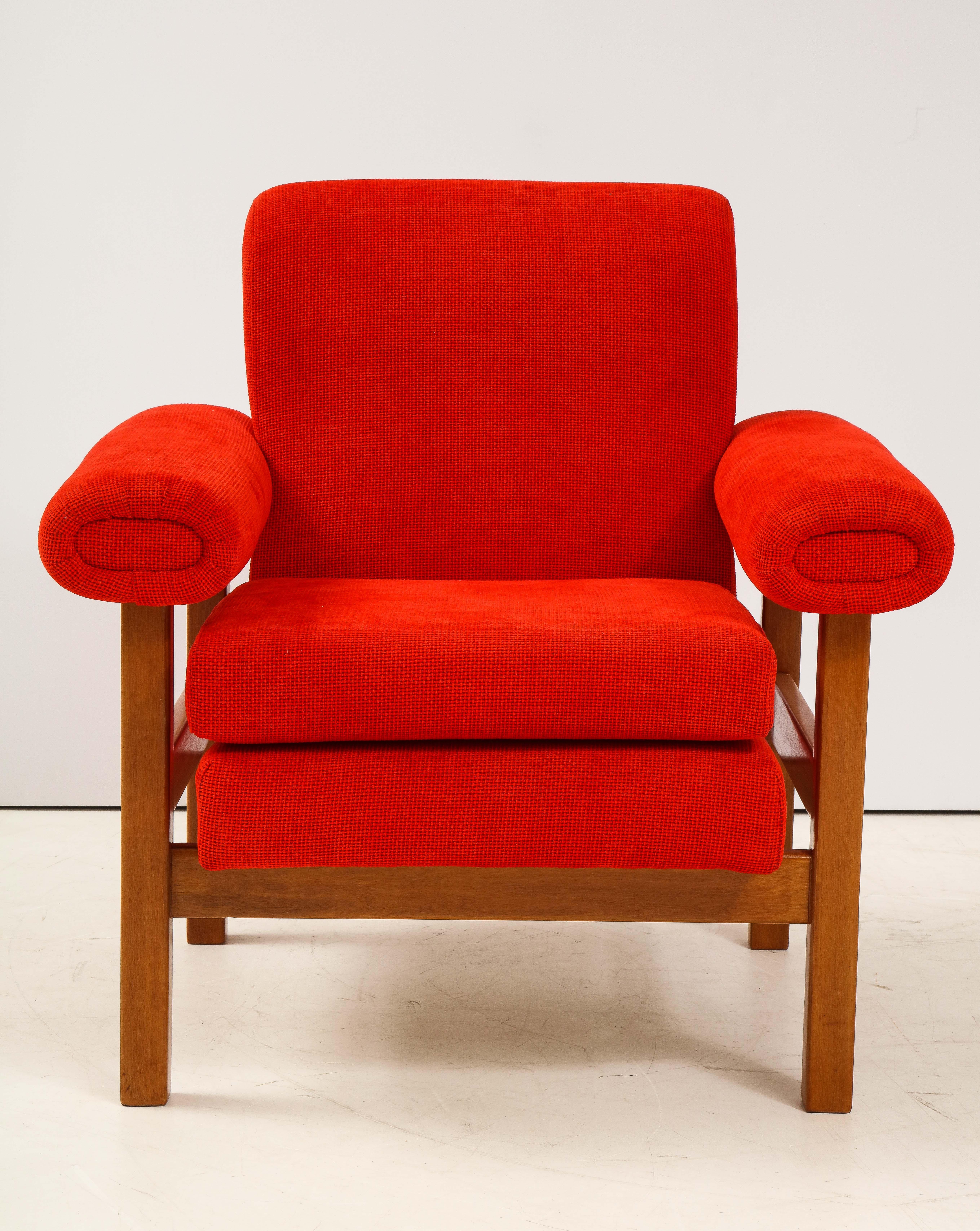 Pair of oak armchairs attributed to Raffaella Crespi; the uniquely rounded shaped arms, entirely upholstered as well as the seat and back all supported on a simple structure made of oak. Newly upholstered in an Italian cotton of burnt orange/red